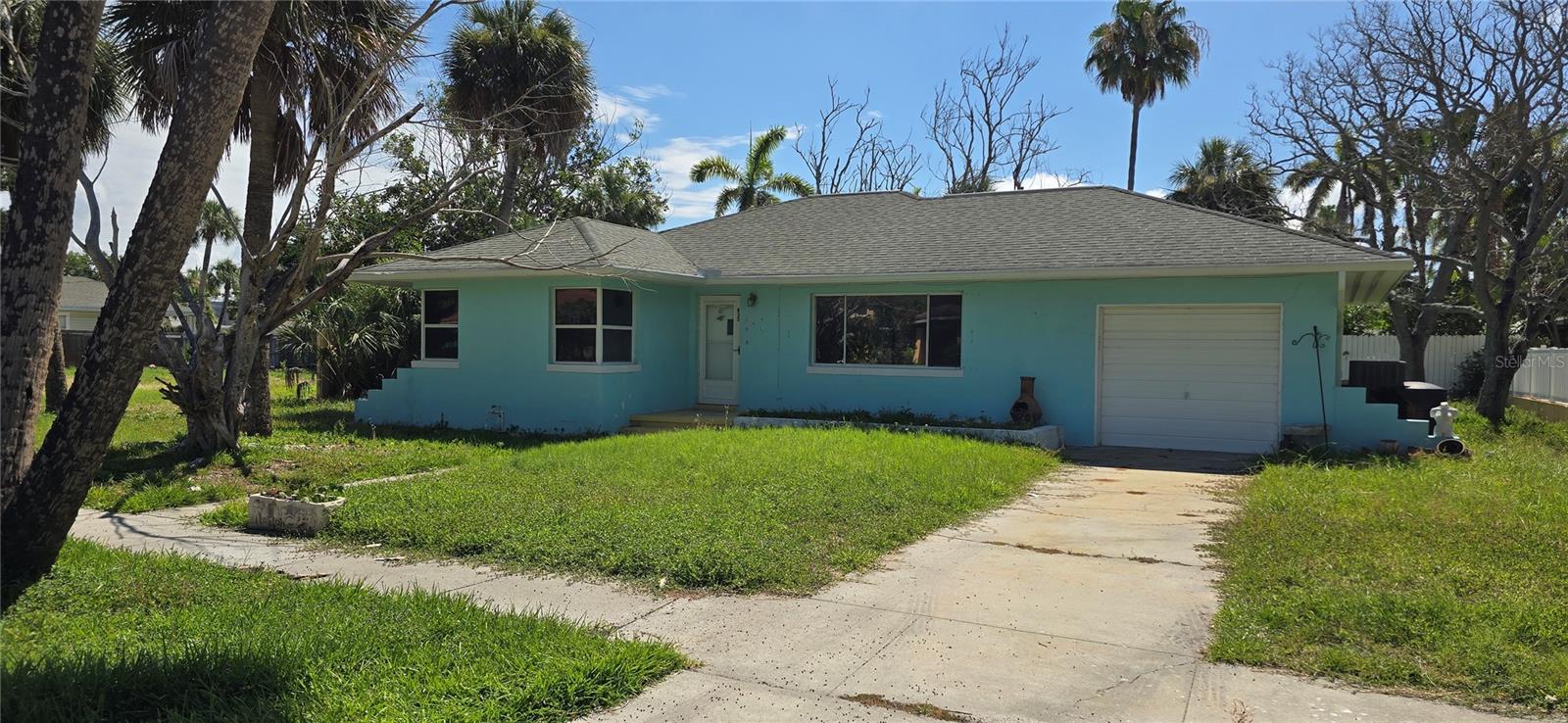 This solidly built 2-bedroom, 1-bath block home offers a spacious living room/family room combination and sits on a generous 0.22-acre lot. Nestled just a few blocks from beach access and only a short distance to the bay, this property is perfectly positioned to enjoy the best of coastal living. While the home experienced flooding, it presents a unique opportunity with endless possibilities for renovation, rebuilding, or creating your dream beach retreat. Whether you're an investor, builder, or buyer with a vision, this property is full of potential. Bring your sandals, imagine the possibilities, and schedule your private showing today!