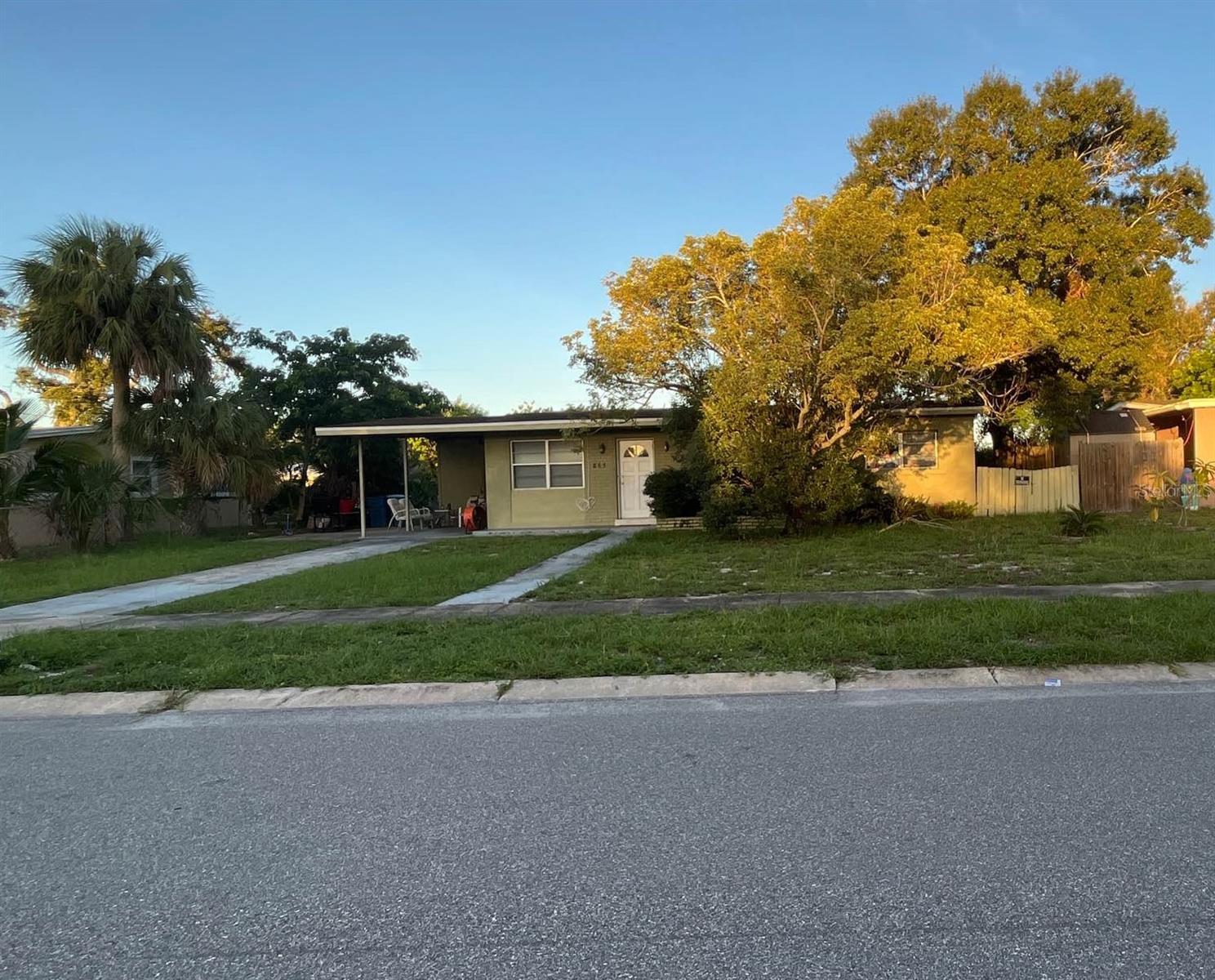 Opportunity awaits in Palm Bay! This 4-bedroom, 1.5-bath home offers over 1,500 square feet of living space on a spacious corner lot in the established Port Malabar community. The single-story layout features a large living area, laminate, tile, and vinyl flooring throughout, central air conditioning, and a functional kitchen with ample cabinet space. Outside, you'll find a covered carport and a generously sized yard with plenty of room for outdoor living, gardening, or future improvements. Conveniently located near shopping, dining, schools, parks, major roadways, and the Indian River, this property offers easy access to everything Palm Bay has to offer. Whether you're looking for a primary residence, investment property, or renovation project, this home presents excellent potential.