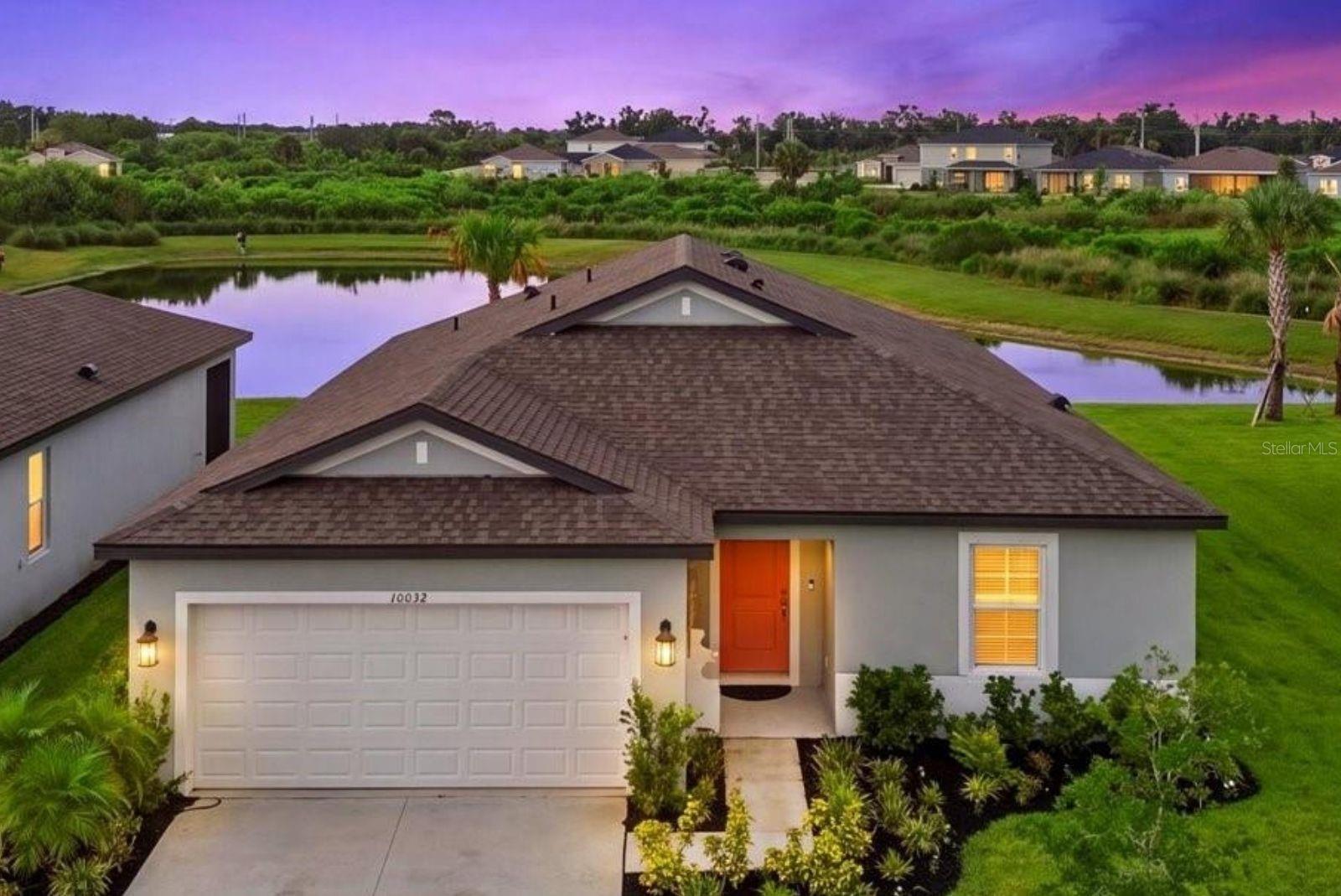 AFFORDABLE FLORIDA LIVING WITHOUT SACRIFICING LOCATION, STYLE, OR CONVENIENCE!

GATED COMMUNITY | SUPER LOW HOA | ONLY 2 YEARS OLD | OPEN FLOOR PLAN | UPGRADED TILE FLOORING | PREMIUM POND VIEW | MASSIVE WALK-IN CLOSET

If you've been searching for the perfect balance of affordability, convenience, and modern style, this is it. Located in the gated section of Summerwoods, one of Parrish's fastest-growing communities, this beautifully upgraded M/I Homes semi-custom residence offers peace of mind, quality construction, and an unbeatable location between Tampa, St. Petersburg, Sarasota, and Lakewood Ranch.

Thoughtfully designed with today's lifestyle in mind, this 4-bedroom, 2-bathroom home showcases carefully selected upgrades throughout. Beautiful neutral tile flooring flows seamlessly through the main living areas and into the primary suite, creating a light, bright, cohesive feel that's ready for your personal style.

The kitchen serves as the heart of the home, featuring elegant cabinetry extended to the ceiling for a custom, designer-inspired look, stunning quartz countertops, abundant storage, and an oversized island overlooking the expansive open-concept living and dining spaces. Whether you're entertaining guests or enjoying a quiet evening at home, the open layout creates a warm and inviting atmosphere.

Sliding glass doors lead to the covered lanai, where you'll enjoy one of the home's most desirable features... a premium pond-view homesite with no rear neighbors. The backyard offers endless possibilities with plenty of room to add a pool, install a fence, create an outdoor entertaining area, or simply relax while enjoying the peaceful water views and added privacy.

The spacious primary suite continues the upgraded tile flooring and features a large picture window overlooking the tranquil pond. The ensuite bathroom offers dual sinks, a walk-in shower, and an exceptionally oversized walk-in closet that provides an incredible amount of storage. Three additional bedrooms offer flexibility for family, guests, a home office, gym, or hobby space (EXAMPLES SHOWN IN PHOTOS) and share a well-appointed full bathroom with a bathtub. Additional highlights include a dedicated laundry room and an attached two-car garage.

Living in Summerwoods means enjoying resort-style amenities including a community clubhouse, fitness center, resort-style pool, splash pad, playground, dog park, and scenic walking trails. Beyond the community, Parrish continues to emerge as one of Florida's most exciting places to call home, with new restaurants, healthcare facilities, fitness centers, Pilates studios, shopping, and the highly anticipated lagoon development all on the way.

This is your opportunity to get into one of the Gulf Coast's fastest-growing communities while prices remain attainable. As Parrish continues to expand and attract new amenities, the value of living here will only become more desirable. Don't miss your chance to own a beautifully upgraded home in a gated community where affordability, convenience, and lifestyle come together. (4th Bedroom is virtually staged to show flexible room options)