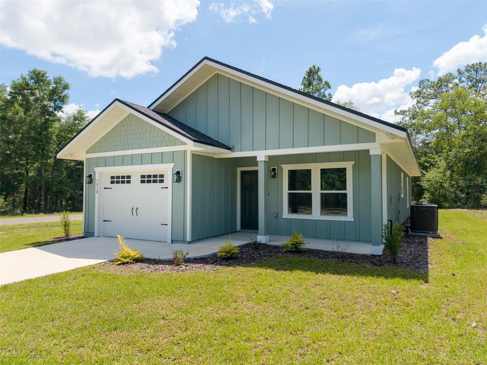 BRAND NEW 3 bedroom 2 bath home located in the Williston Highlands community and about 35 minutes from Gainesville. Set on a spacious corner lot, this home will provide a great retreat in a laid-back rural setting. Step inside to soaring cathedral ceilings, an open floor plan and LVP flooring. The large great room connects to the well-appointed kitchen with an island breakfast bar, granite counters, sleek shaker cabinetry and walk-in pantry! The primary bedroom features trim work with tray ceilings, large walk-in closet and en-suite bath. 2 guest bedrooms are bright and offer 9-foot ceilings while sharing their own luxurious bathroom. Other unique features include high-efficiency, double-pane windows, private laundry room, and spacious one-car garage. Call to schedule your tour today!