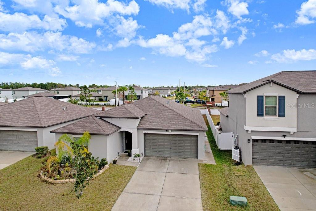 Welcome to South Fork in Riverview, where comfort, style, and convenience come together in this beautifully maintained 4-bedroom, 2-bathroom home offering over 1,900 square feet of thoughtfully designed living space. Step inside to an open-concept floor plan featuring ceramic tile flooring throughout the main living areas. The modern kitchen is the heart of the home, showcasing 42-inch cabinetry, granite countertops, a large center island, and ample space for entertaining family and friends. The desirable split-bedroom layout provides privacy and functionality, with three secondary bedrooms and a full bathroom situated separately from the spacious owner's retreat. The primary suite features a generous walk-in closet and an ensuite bathroom designed for relaxation and comfort. Additional highlights include a large laundry room, a two-car garage, and a covered lanai perfect for enjoying Florida's beautiful weather. The expansive backyard offers endless possibilities for outdoor entertaining, recreation, or future enhancements. Residents of South Fork enjoy access to exceptional community amenities, including a resort-style pool, playground, basketball court, and dog parks. Conveniently located just minutes from I-75, St. Joseph's Hospital, the South Hillsborough VA Clinic, AdventHealth Riverview Hospital, shopping, dining, and entertainment destinations. Don't miss this incredible opportunity to own a beautiful home in one of Riverview's most sought-after communities. Schedule your private tour today!