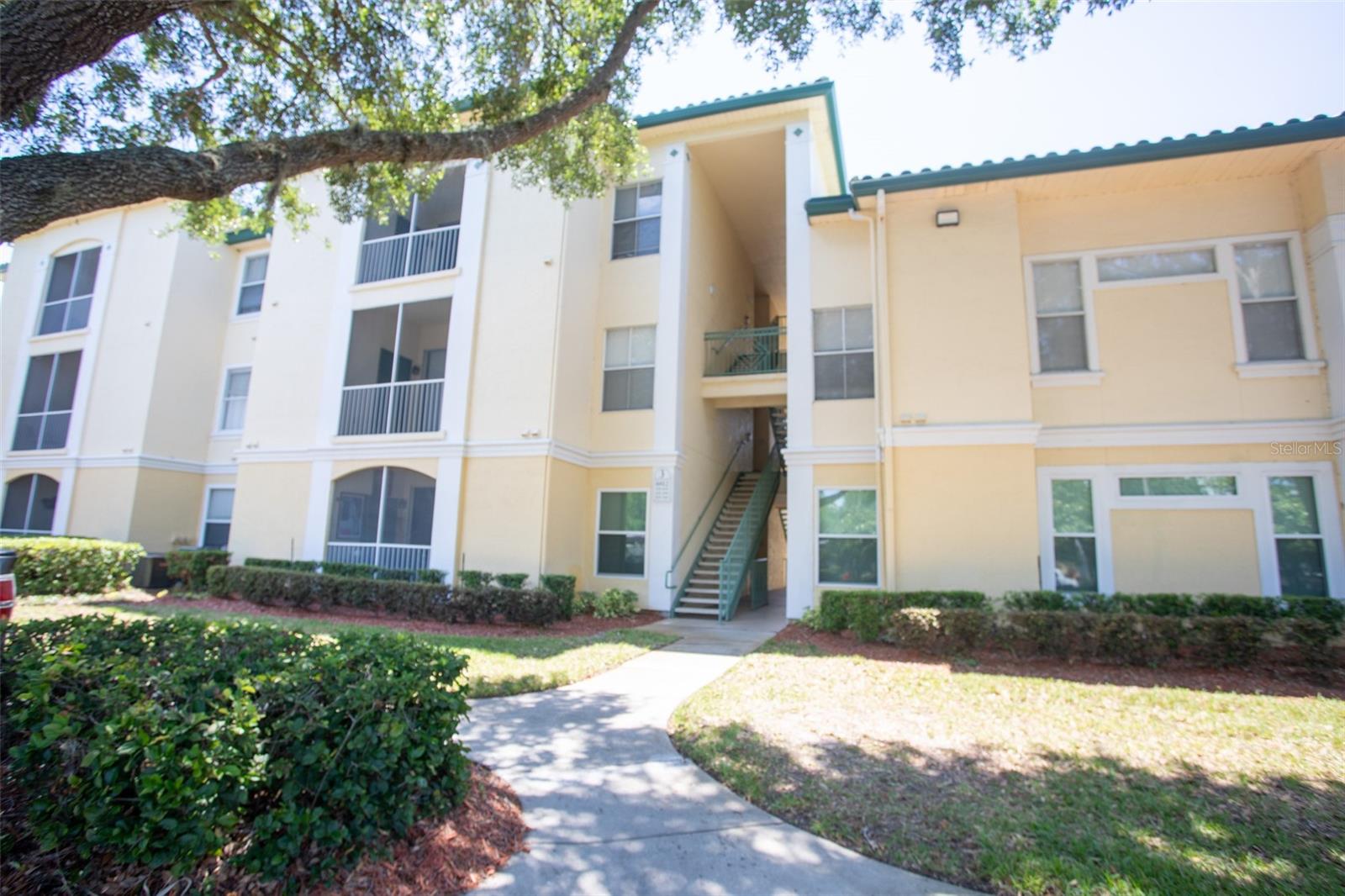 Ideal for investors, vacation-home buyers, or full-time residents, this freshly painted 2-bedroom, 2-bath condo offers 1,048 square feet of comfortable living space, new carpet, an open floor plan, solid-surface countertops, an in-unit washer and dryer. Legacy Dunes allows both short-term and long-term rentals with no minimum lease period and offers resort-style amenities including two pools, a fitness center, game room, tennis and volleyball courts, playground, BBQ and picnic areas, walking paths, and a car wash and vacuum station. Conveniently located just minutes from Disney, shopping, dining, and entertainment, this gated, pet-friendly community offers an excellent opportunity for a primary residence, vacation home, or rental investment. Schedule your showing today!