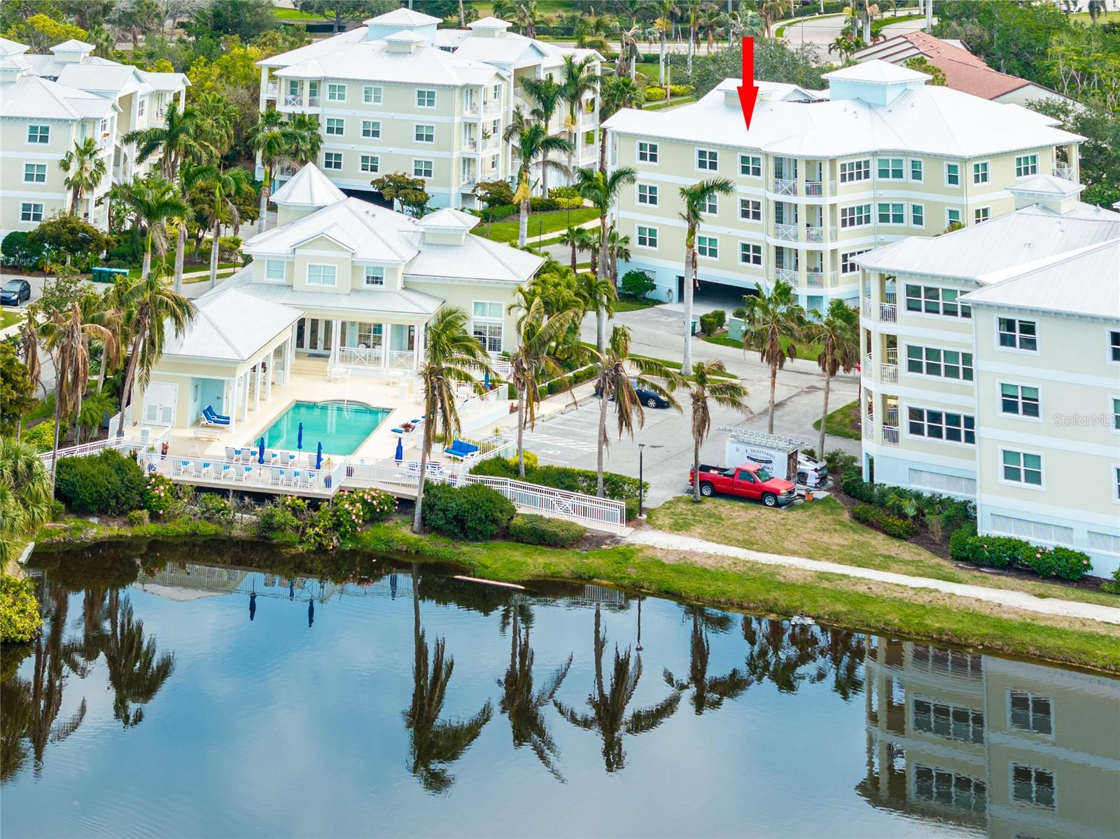 Seller is motivated!  Experience refined coastal luxury living in the highly sought after Palma Sola Bay Club. This stunning TOP FLOOR 3 bedroom, 2.5 bath condo, built in 2023, is completely move-in ready and showcases the perfect blend of modern elegance and everyday comfort. From the moment you enter, you’re welcomed by soaring 10-foot ceilings, abundant natural light, and partial bay views that create a warm and inviting atmosphere.
Designed for both entertaining and daily living, the open-concept floor plan seamlessly connects the gourmet kitchen, dining, and family room. The chef’s kitchen is truly a showpiece, featuring white shaker cabinetry, upgraded quartz countertops, high-end GE Café appliances including an induction oven, under-cabinet lighting and a spacious walk-in pantry with custom wood shelving. The expansive living and dining areas offer beautiful views and comfortably accommodate gatherings of any size, while French doors lead to the main balcony—perfect for enjoying breathtaking sunset views over the bay!  A thoughtfully designed split floor plan provides privacy, with the primary suite and an additional bedroom and bath on one side and a third bedroom with full bath on the other. The oversized primary suite is a true retreat, featuring private balcony access and a spa-inspired bathroom complete with a soaking tub, dual vanities, a rain shower, and a large custom walk-in closet. Additional highlights include wood-look tile flooring throughout (no carpet), a laundry room with built-in cabinetry and a brand-new LG ThinQ stackable unit and a smart-enabled HVAC system with humidistat for added comfort and control. Enjoy the benefits of top-floor living with no neighbors above, enhanced views and convenient elevator access. The unit also includes two reserved parking spaces located directly under the building.  Palma Sola Bay Club is a gated 30-acre waterfront community offering resort-style amenities including a pool, fitness center, clubhouse with billiards, dog park, firepit, putting green, grilling areas, and a kayak launch with direct bay access. Cash and Conventional financing! The $1,060/month condo fee covers nearly everything—cable, nationwide internet access, water, sewer, trash, insurance, exterior maintenance and all amenities—delivering a truly maintenance-free lifestyle.  With year-round community events and immediate rental availability, this property is ideal as a primary residence, vacation home, or investment opportunity. All of this just minutes from the world-renowned beaches of Anna Maria Island and Longboat Key, and close to IMG Academy. Come experience the lifestyle for yourself!
