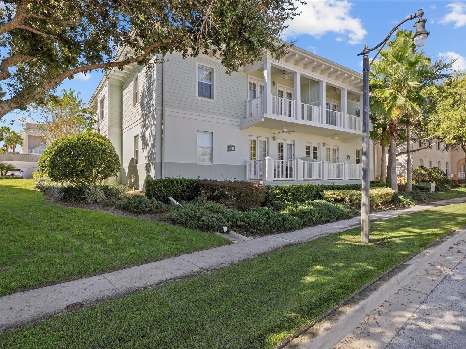 Welcome to this sun-filled, modern-style 3-bedroom condo in the highly desirable gated Reunion Resort at the Terraces, just minutes from Disney! Thoughtfully updated and designed for comfort with a little Disney magic, this first-floor living oasis offers the perfect blend of the resort living and everyday ease. Inside the front door, you are greeted with the beautiful Cinderella castle, and themed guest book. The open living and dining area is bright and welcoming, featuring Carl and Ellie from the movie Up, a modern aesthetic, and 2 sets of french glass doors that open to a private covered porch/balcony with a ceiling fan. Enjoy a direct view of the beautiful, peaceful resort golf course - ideal for morning coffee or evening relaxation. Enjoy cooking with Remmy in the Ratatouille themed kitchen, with stainless steel appliances, granite countertops, and a breakfast bar that makes casual dining effortless.  Retreat to the Beauty and the Beast themed king bed suite, complete with a walk-in closet, digitally locked owners closet, and double sink bathroom with its own linen closet.  The additional bedrooms offer flexibility for family, guests, or a home office.  The floor-to-ceiling, Zootopia-themed, complete room mural, queen bedroom would make the coolest kids room or guest room with your favorite characters hand-drawn and painted on the walls!  A cheerful Mickey and Minnie themed twin bedroom adds character and charm, perfect for little ones. Additional highlights include the in-unit Cinderella themed laundry, fast Wi-Fi, easy parking, and modern living space designed for low-maintenance living. Step outside and enjoy being just moments from the Terraces lap pool and 8 other community pools and hot tubs home owners may access, all within the gates of Reunion Resort. This fully furnished condo includes all furniture, bedding, appliances, wall and home decor, electronics, kitchenware, and baby/child amenities. In addition to all of the aforementioned material items, Direct TV, Internet, water, trash are included in the HOA, so you not only experience an all inclusive stay, but an all inclusive purchase! Whether you're looking for a primary residence, vacation home, or investment opportunity, this condo delivers comfort, style, and unbeatable location in one of Central Florida's most sought-after communities.