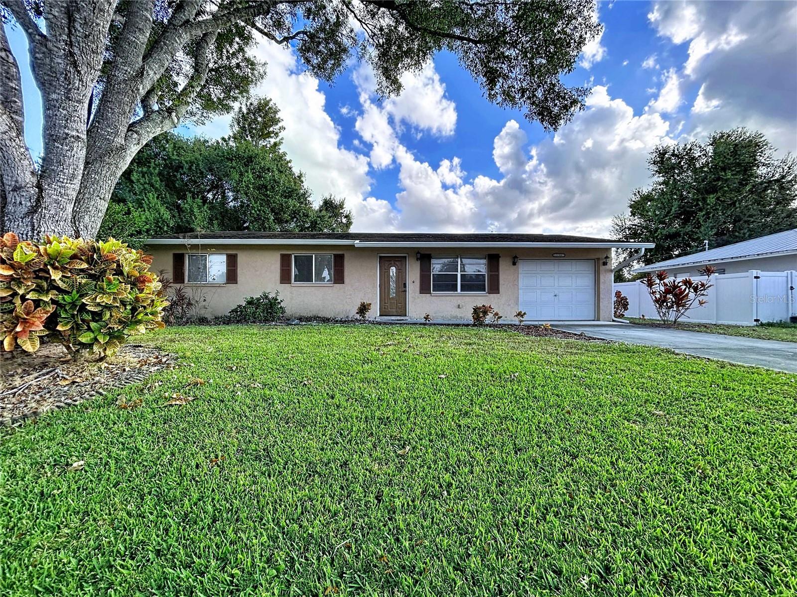 Welcome home to this updated 3-bedroom, 1 bath home in Ft Myers Shores. The garage area (which was a room) has recently been treated for mold and has been remediated. The floor and one wall had to be removed for this work. So right now, that area is not in a finished condition and home will be sold as is. New owner will decide how to proceed and be responsible for completing. You will have plenty of space for your family, including a big, fenced backyard for all to enjoy. After Ian, Home was completely redone and includes a 3 yr old AC, new flooring and appliances. Friendly neighborhood with docks and river nearby. Very convenient location, Garage area was originally converted to a room when home was built. Close to shopping, restaurants, churches, downtown Ft Myers and a 25-minute drive to Ft Myers International Airport.