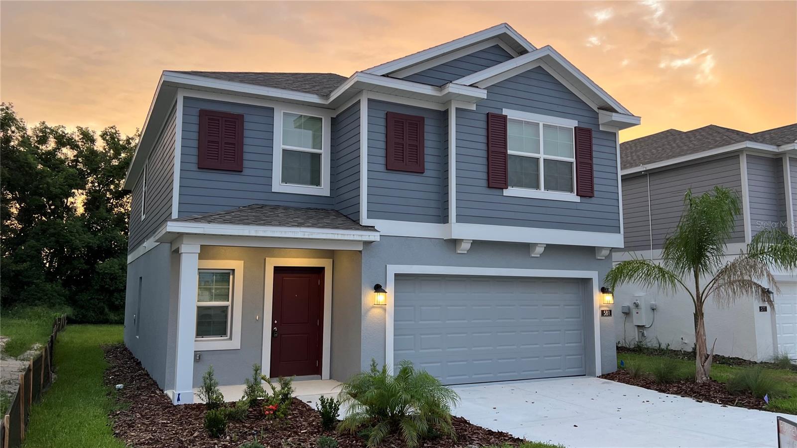 Welcome to your brand-new home in the sought-after community of Leomas Landing, Lake Wales! Built in 2024, this stunning two-story residence offers 5 bedrooms, 2.5 bathrooms, and a versatile loft providing ample space for comfortable family living. The open-concept layout seamlessly connects the kitchen, dining, and living areas, making it ideal for both everyday life and entertaining. The modern kitchen is a true highlight, featuring sleek cabinetry, granite countertops, and top-of-the-line stainless steel appliances. Downstairs, you’ll find elegant ceramic tile flooring and a dedicated laundry room for added convenience. All bedrooms and the loft are located upstairs, offering privacy and a peaceful retreat. Step outside to enjoy a cozy front porch and a spacious, fully fenced backyard for added comfort and security, perfect for outdoor gatherings and relaxation. Located just 4 minutes from Eagle Ridge Mall and 5 minutes from US Hwy 27, you’ll have quick access to supermarkets, gas stations, convenience stores, and more. Don’t miss this incredible opportunity to own a brand-new home in one of Lake Wales’ most desirable communities. Schedule your showing today!!