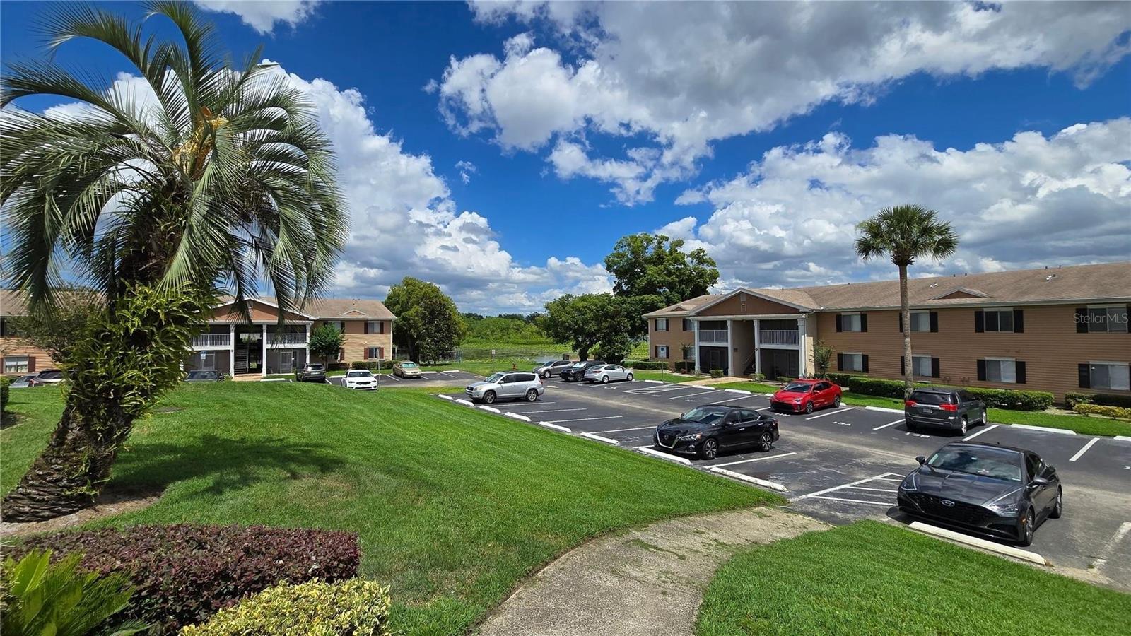 OPPORTUNITY to live in the peaceful, serene, gated LAKEFRONT community of Cove at Lake Pear; CONVINIENTLY located near all major roads, amenities, medical facilities, schools, entertainment, Cranes Roost Park, parks and restaurants. This spacious updated second floor spacious 2bed/2 bath condo features LAKEVIEW, open floor plan, updated kitchen, vinyl flooring throughout, spacious bedrooms, vaulted ceiling with skylight, storage & inside laundry. The upgraded kitchen with stone countertops, SS farmer sink, matching appliances, oversized pantry and breakfast bar overlooks the family room & lake; adjoining the spacious dining areas—great space for entertaining. French doors from Living Area open onto the screened Lakefront balcony - ideal for morning coffee or quiet evenings. The large primary bedroom, overlooking the lake offers large walk-in closet space and easy access to a fully updated bathroom with double sinks, separate shower & lighting.  A second bedroom and full bath provide flexibility for guests, a home office, or a hobby space. Residents of The Cove at Pearl Lake enjoy a variety of resort style amenities for active residents including gate with controlled access, a sparkling community pool, and a fitness center. Comfortable living at its best.