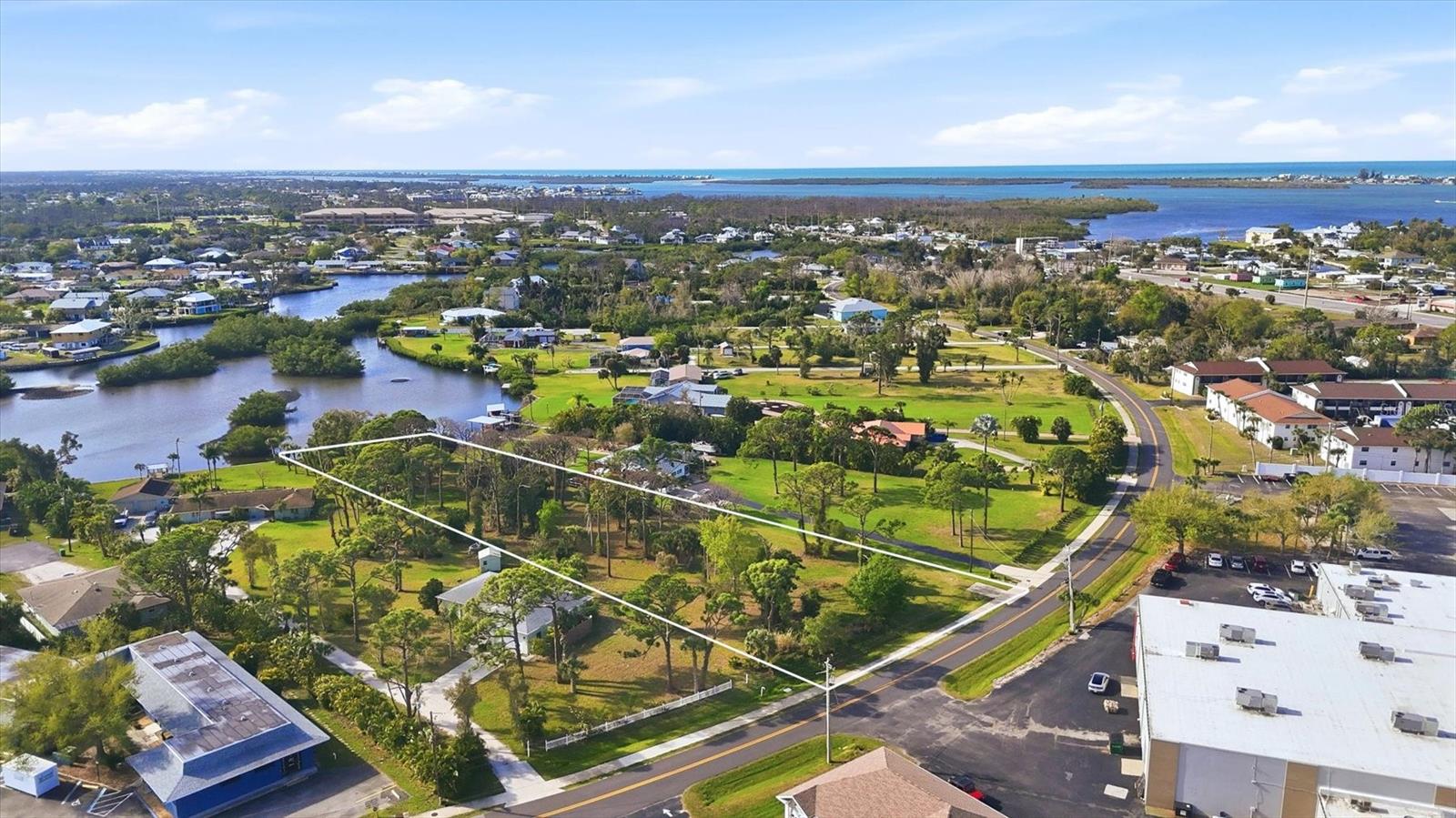Build your dream home in the heart of Englewood on this spacious vacant lot on Manor Road! Perfectly positioned at 1455 Manor, this property offers the best of coastal living—just one bridge from Lemon Bay and moments from the sparkling Intracoastal Waterway, making boating, waterfront dining, and sunset views effortlessly accessible. In a quiet residential setting, this property offers plenty of room to create the Florida lifestyle you've been looking for. Design a custom home with space for outdoor living, a pool, or storage for your boat and recreational gear. Enjoy being just a short drive from Englewood's beautiful Gulf beaches, boating and fishing opportunities, golf courses, shopping, dining and charm of historic Dearborn Street. Nearby parks and public boat ramps make it easy to enjoy everything Southwest Florida has to offer. Whether you're planning to build now or invest for the future, this property is a great opportunity to secure land in a desirable and growing coastal community. Don't miss the chance to turn your vision into reality in sunny Englewood.