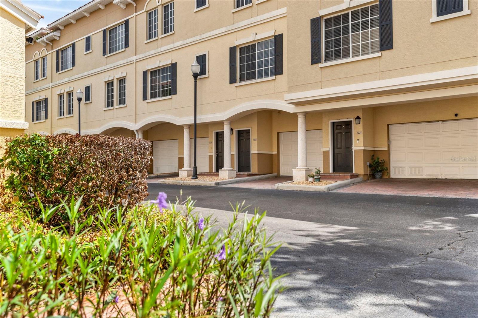 Virtually Staged. Find a great blend of modern living and convenience in this nicely updated South Tampa townhome with an attached garage.
Your new home is ideally situated just minutes from boating, golf, tennis, pickleball, the stunning Gulf Coast beaches of St. Pete and Clearwater Beaches, Tampa International Airport, and St. Pete Clearwater International Airport. It's also located minutes from top rated and casual dining, shopping, sporting events, and cultural attractions near Downtown Tampa, Hyde Park Village, and Downtown St. Petersburg. Inside, you'll have a bright modern feel. Your kitchen offers premium Whirlpool stainless steel appliances, complemented by luxury plank flooring and tile that runs throughout the home, from moment you enter through the freshly painted front door and bright tile in your entrance. The beautiful Pottery Barn window treatments add a luxury finish, while new sconces, chandeliers, and ceiling fans enhance the atmosphere with both style and functionality. Modern LED lights and updated switches provide a new home feel, with new screens and blinds for both privacy and convenience. The first master suite has modern luxury updates, featuring a beautiful high-end quartz countertop vanity, and upscale faucets. The second master bathroom has also been updated with a new vanity, lights, fixtures and toilet. Additional upgrades include a new garage door opener, providing added security and ease of access. Enjoy the convenience of walk-in closets and an on-site newer matching washer and dryer, making everyday living easier. Located within A-rated school districts of South Tampa, approximately a 5 minute walk to Publix, and steps to other adjacent neighborhoods, this home also offers exceptional community amenities. Take advantage of the gorgeous resort-style pool, a newly remodeled clubhouse and club/game room with kitchen, and a well-equipped gym with weights and cardio machines; all just steps from your door, in this quiet, pet-friendly community. Schedule your private tour today, and learn about how you can purchase with special financing programs, or park some of your cash in real estate, so you can own, or invest, while living in your new South Tampa home today!