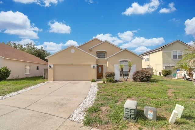 Home Sweet Home.  This delightful 4/2 with 2 car garage.home personalized for you!  The major things are good, ROOF 2020!  Some carpet changes and paint would go a long way.  Great location of convenience.  Easy drive to the theme parks from here.