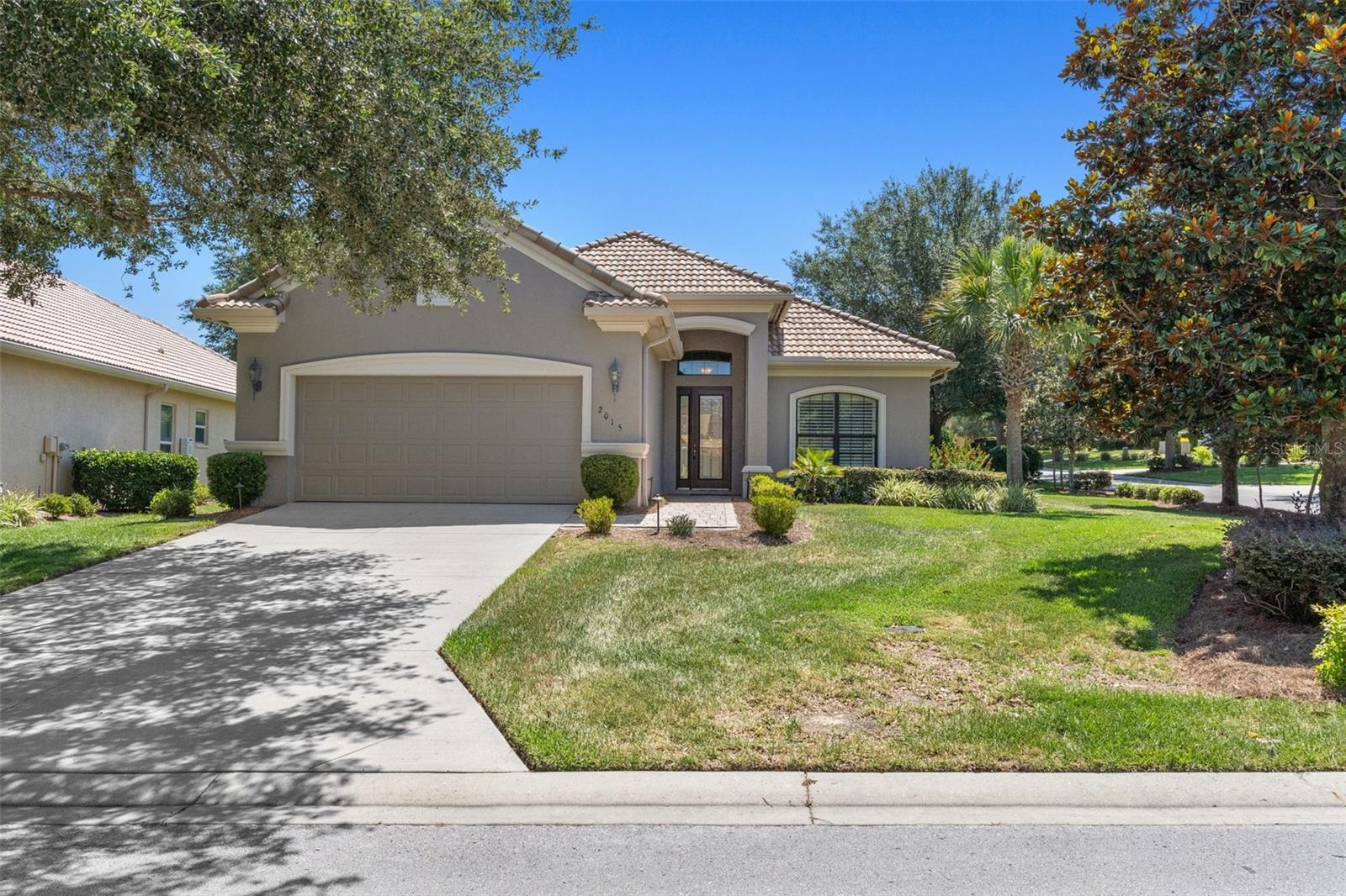 YOU FOUND IT! Experience the best of Florida living in this beautifully upgraded, maintenance-free villa located in the highly sought-after gated community of Terra Vista at Citrus Hills. Situated at an elevation of 96 feet, this home offers added peace of mind with no flood insurance required and no storm surge concerns. Designed for easy living, this popular St. James floor plan features 3 bedrooms, 2 bathrooms, and a versatile flex room currently used as a den, which could be a third bedroom - all centered around an open-concept layout. Built with energy efficiency in mind, the home includes a radiant heat barrier in the attic, enhanced wall insulation, and other quality construction features that help maximize year-round comfort. The thoughtfully designed kitchen showcases rich wood cabinetry, Cambria quartz countertops, and abundant workspace, flowing seamlessly into the spacious living and dining areas. Elegant crown molding, custom window treatments, and quality finishes throughout add warmth and sophistication. Step outside to your private backyard retreat, complete with an expanded screened lanai, saltwater pool, summer kitchen with a natural gas grill, and generous pool deck—perfect for relaxing or entertaining family and friends. The spacious primary suite offers dual walk-in closets and a luxurious bath featuring a walk-in shower accented with beautiful Listello tile. Guests will enjoy exceptional privacy thanks to a pocket door that creates a separate guest wing with a bedroom and a full bath. Additional highlights include an oversized garage with abundant storage, extra storage in the laundry room, and maintenance-free lawn care, allowing you to spend more time enjoying everything this exceptional community has to offer. As a resident of Terra Vista at Citrus Hills, you'll enjoy access to world-class amenities, including four championship golf courses, multiple resort-style pools, fitness centers, a full-service spa, exceptional dining, scenic walking trails, tennis and pickleball courts, and an active social calendar with clubs and activities for every interest. This exceptionally maintained villa combines luxury, comfort, and convenience in one of Citrus County's premier master-planned communities. Schedule your private showing today and discover why so many choose to call Terra Vista home.