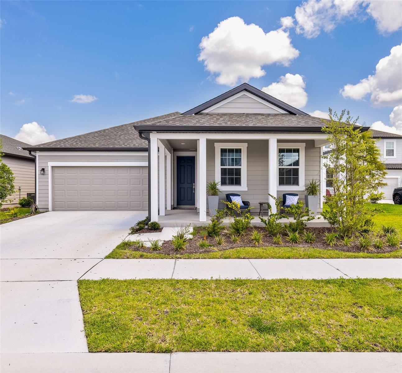 Waterfront! No CDD! No Carpet! This beautifully designed open-concept ranch home offers the perfect combination of modern finishes, low-maintenance living, and an unbeatable location less than 3 miles from Lake Nona.

Featuring 3 bedrooms and 2.5 bathrooms, this thoughtfully designed home boasts luxury vinyl plank flooring throughout—no carpet anywhere. The gourmet kitchen is the heart of the home, showcasing 42-inch cabinetry, quartz countertops, a designer tile backsplash, stainless steel appliances, and a large island that’s perfect for entertaining.

The spacious open-concept layout flows seamlessly into the living and dining areas, while large windows frame peaceful waterfront views, creating the perfect setting to relax and unwind.

Ideally located near SR-417, Lake Nona, Sunbridge, Orlando International Airport, shopping, dining, and world-class medical facilities, this home offers both convenience and tranquility.

With no CDD fees, a low monthly HOA, and a prime waterfront homesite, this move-in-ready home is an exceptional opportunity to enjoy the best of Central Florida living.