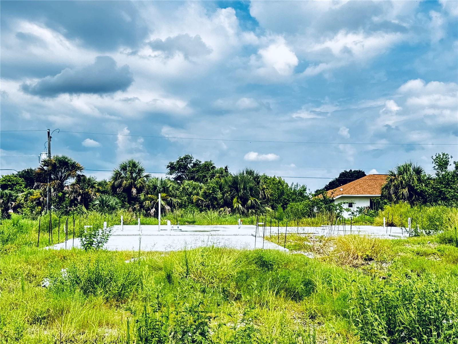 Come check out this GREAT land, which offers customization options with spacious 3-bedroom, 2-bathroom, 1 half bathroom home featuring a 
versatile layout. This opportunity offers freedom to personalize your dream living space. Enjoy the benefits of a private lot without the restrictions of a homeowners association. This property is being offered in its current state of construction. Buyers have the exclusive opportunity to personalize finishes, fixtures, and interior design to match their unique style. Underground  plumbing and slab foundation are already installed.This property is located  a short distance from Warm Mineral Springs, stunning gulf beaches, fishing, boating, golfing, and the brand new Downtown Wellen Park, which features shops, restaurants, groceries, Atlanta Braves Spring Training Facility and more! Easy access to I-75 and US 41.