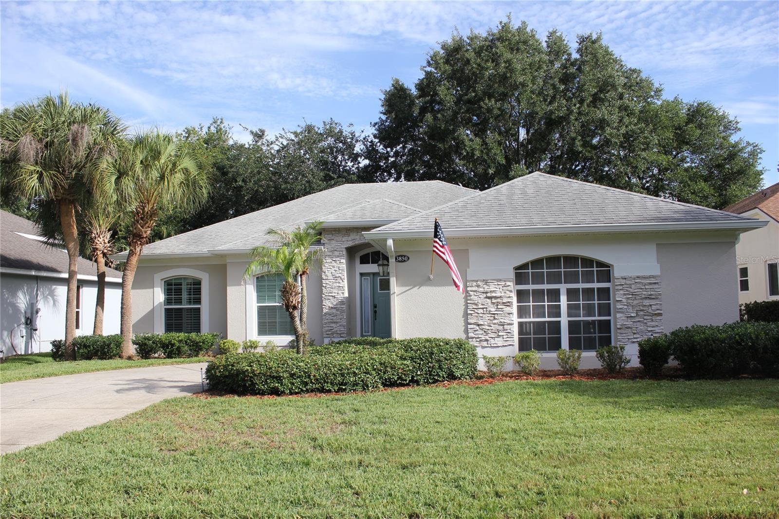 Welcome to resort-style living in the highly sought-after Legends Golf Community! This beautifully maintained home has been thoughtfully updated and offers stunning golf course views overlooking the 12th fairway and 13th tee box, positioned so you can enjoy the scenery without worrying about stray golf balls.

The home features completely remodeled bathrooms with elegant granite and marble countertops, a handicap-accessible walk-in shower, and a separate whirlpool tub for ultimate relaxation. Multiple skylights throughout the home provide abundant natural light, creating a bright and inviting atmosphere.

Recent updates include a new A/C system (2016), windows replaced in 2012, fresh exterior paint in 2025, new flooring throughout, functional irrigation, and attractive new window shutters. The covered and screened-in patio offers the perfect space to enjoy morning coffee or evening sunsets while taking in the golf course views.

Additional features include attic storage above the garage, dedicated space for a golf cart, and a curved driveway with parking for up to six vehicles.

As a resident of Legends, you'll enjoy exceptional amenities including a resort-style pool, fitness center, pickleball courts, tennis courts, and poolside food and beverage service. Golf enthusiasts will appreciate the resident discounts available for play at Legends Golf Course, making it easy for the entire golf group to enjoy one of Central Florida’s premier golfing destinations.

This home combines comfort, accessibility, beautiful upgrades, and an unbeatable lifestyle in one of the area's most desirable golf communities. Don't miss this opportunity to enjoy luxury living with world-class amenities right outside your door!