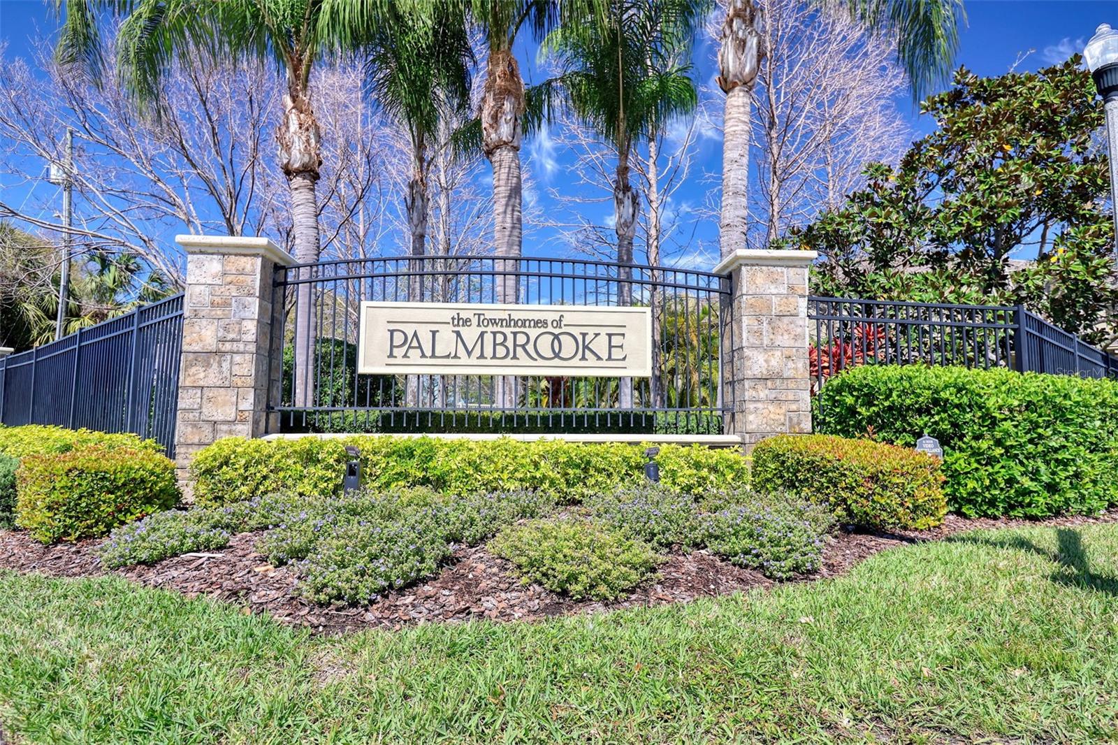 This is a spacious 2 bedroom   townhome with high ceilings and a two car garage.  Stone counters and a dishwasher in the kitchen with pass through as well as dining space.  Screened lanai and a pond view.  Upstairs the split plan bedrooms feature volume ceilings and ceiling fans. There is a   significant loft space, washer and dryer and the  primary is  ensuite.  This is a well thought out gated community for all ages.