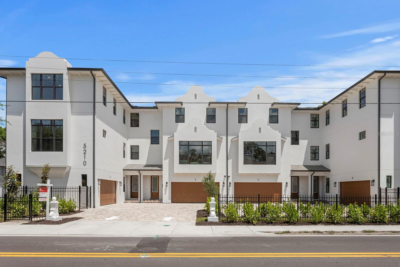 Discover Chateau Blanc, an exclusive four-unit townhome community nestled in the highly desirable Ballast Point neighborhood of South Tampa. Designed with sophistication and livability in mind, each thoughtfully crafted residence blends timeless architectural charm with cutting-edge features and finishes. These expansive 4-bedroom townhomes each include a dedicated office/study (currently shown as Bedroom 4), spacious recreation room, 2 car garage and 3.5 beautifully appointed bathrooms—including a charming Jack & Jill bath connecting the secondary bedrooms. Soaring 9-10’ ceilings, bay windows, and CGI bronze-colored impact-resistant windows create a bright, airy ambiance throughout. The open-concept living space centers around a large chef’s kitchen featuring European flat panel style cabinetry, waterfall quartz countertops, a walk-in pantry, and premium Bosch appliances—including a gas range and an Avallon wine/beverage fridge. Designer lighting and plumbing fixtures from Ferguson Home elevate the aesthetic, with curated selections by Delta. Every unit includes private green space and a rear deck, perfect for indoor-outdoor living. Constructed with enduring quality by Shell Basix using all concrete block construction (except bay window accents), Chateau Blanc offers both beauty and structural integrity.  Don’t miss your chance to be part of this boutique community that offers refined living in one of Tampa’s most sought-after neighborhoods. Chateau Blanc — Where Modern Luxury Meets Classic Ballast Point Charm. **Please note, photos have been taken of Unit 2 when it was staged.  Unit 3 is currently vacant and is the same floor plan as Unit 2**
