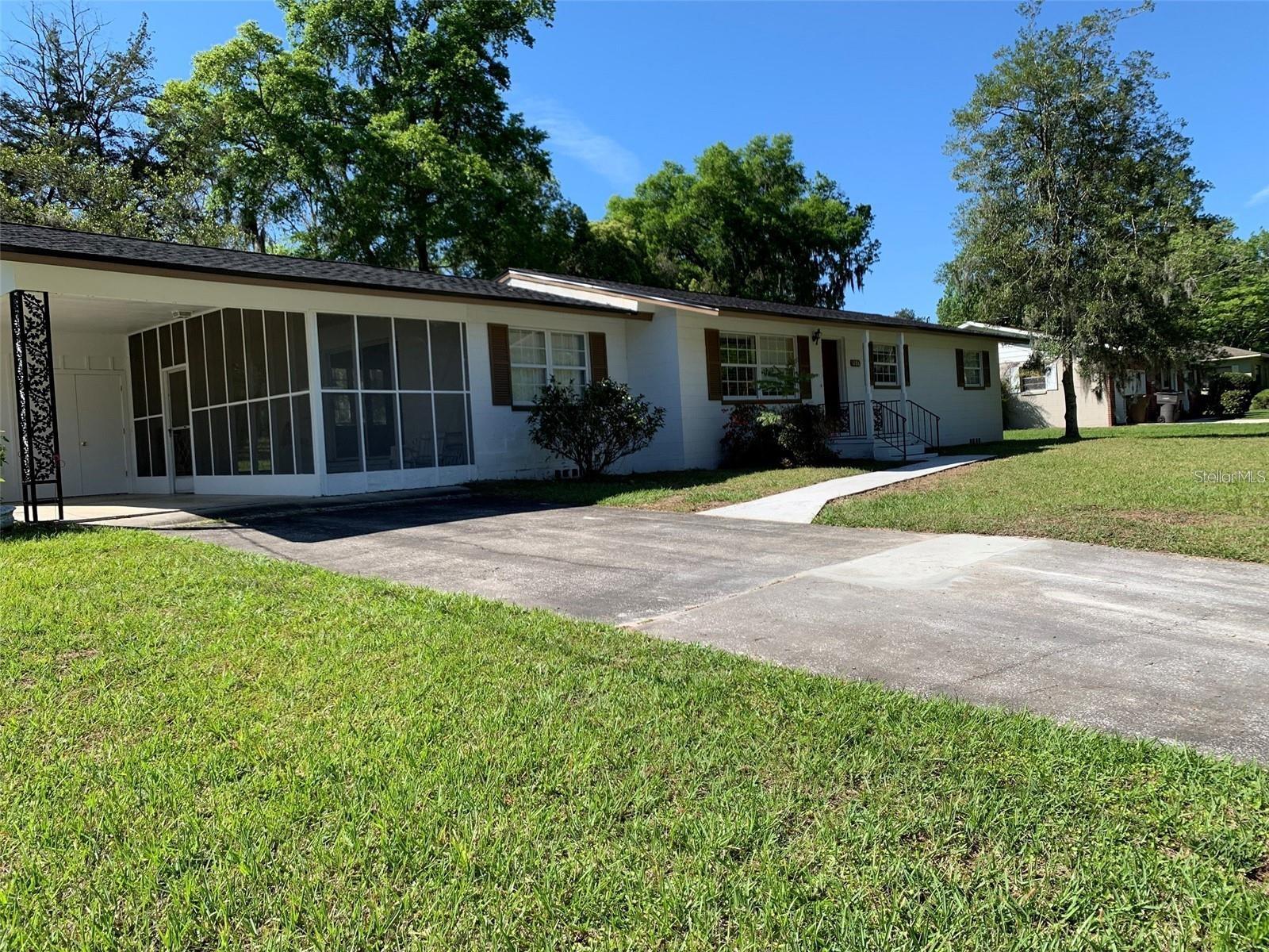 TO INVESTORS ADVANTAGE- BUY & HOLD AND OWNER OCCUPANT. 3 BED / 2 BATH - 1392 SQ FT HOME IN THE HEART OF OCALA, CONCRETE BLOCK CONSTRUCTION- LG 0.37 ACRE LOT WITH FUTURE OUTDOOR ENHANCEMENT POTENTIAL, NO HOA RESTRICTIONS, LOW MAINTENANCE FLOOR PLAN. ATTRACTIVE LONG TERM TENANTS, STRONG RE-SALE APPEAL. ESTABLISHED NEIGHBORHOOD, CLOSE TO SHOPPING HEALTHCARE, SCHOOL.  WHETHER YOU BUY OR HOLD RENTAL, LONGTERM CASH FLOW- 1031 EXCHANGE PROPERTY OR PORTFOLIO EXPANSION. KITCHEN HAS NEW GRANITE COUNTERTOPS, WOOD & VINYL FLOOR. SPACIOUS LIVING & FAMILY ROOMS- DINING ROOM- SCREENED LANAI- COVERED CARPORT - LAUNDRY ROOM - EASY ACCESS TO I-75 AND SR 200.   OCALA CONTINUES TO EXPERIENCE GROWTH, EMPLOYMENT EXPANSION, NEW COMMERCIAL DEVELOPMENT, INFRASTRUCTURE IMPROVEMENTS - INCREASING HOUSING DEMANDS.  THESE MARKET FUNDAMENTALS MAY SUPPORT LONG-TERM APPRECIATION WHILE GENERATING RENTAL INCOME. WHETHER AS A DISTINGUISHED PRIMARY RESIDENCE OR A STRATEGIC INVESTMENT ASSET, THIS HOME STANDS AS A RARE BALANCE OF COMFORT, LOCATION AND LASTING VALUE IN ONE OF OCALA'S APPRECIATING CORRIDORS.