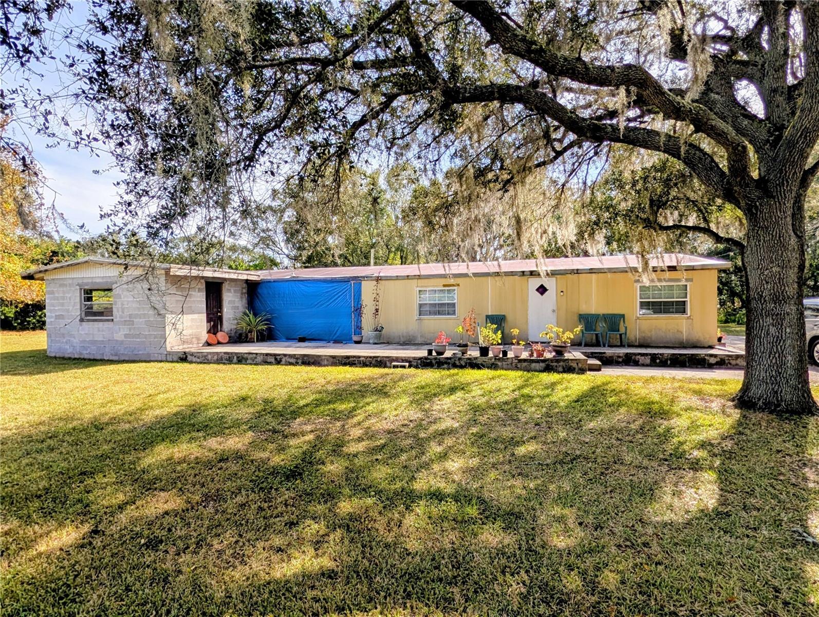 Discover an incredible opportunity in the heart of Odessa at 8412 Peterson Rd—a spacious property providing endless possibilities. Whether you're looking to completely remodel the existing home or start fresh and build the custom residence of your dreams, this lot provides the ideal canvas.

Nestled in a highly desirable area known for its peaceful surroundings, acreage properties, and upscale homes, this site allows the freedom to create a private retreat tailored to your vision. The current structure provides solid potential for investors or buyers seeking a full renovation project, while the generous lot size and prime location also make it perfect for new construction.

Enjoy the tranquility of country-style living while remaining just minutes from top-rated schools, everyday conveniences, and major roadways with easy access to the Veterans Expressway, Citrus Park Mall, dining, and parks and recreation. Whether you’re dreaming big or looking to bring new life to the existing home, this property is ready to become something truly special.