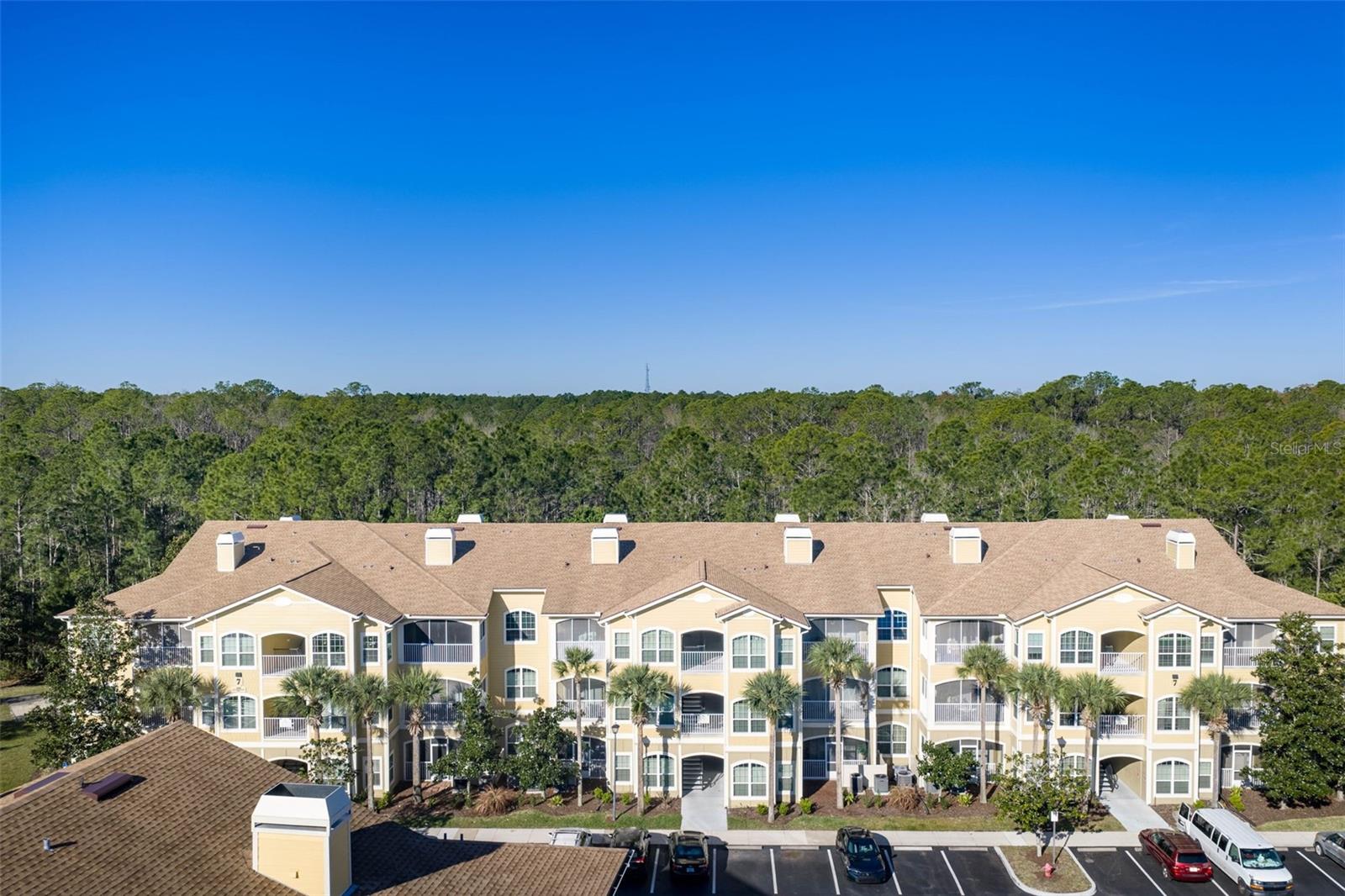 Seller is offering a $1,000 credit that the Buyer can use toward flooring, down payment, or other eligible closing expenses.

1% LENDER CREDIT ALSO BEING OFFERED THAT BUYER CAN USE TOWARDS A RATE BUY DOWN OR DEPOSIT!

Welcome to this beautifully updated and spacious top floor condo, thoughtfully designed for comfort and convenience. Freshly painted throughout and featuring vaulted ceilings, this condo has an updated kitchen complete with a new sink, faucet, garbage disposal, and the added bonus of a pantry for extra storage.
Both bathrooms have been refreshed with new faucets and updated cabinetry, while the oversized primary suite offers a peaceful retreat with direct access to the balcony, perfect for enjoying your morning coffee or evening unwind. The primary bathroom includes a large tub/shower combo for added comfort with a walk in closet.
The split floorplan provides ideal privacy, with a generously sized secondary bedroom that functions as a private ensuite, also featuring a walk-in closet and its own tub/shower combination. 
Enjoy added peace of mind and savings with brand-new hurricane impact windows, helping reduce insurance costs. Then step outside to your private balcony recently updated with new screens, making it perfect for grilling and entertaining.
Additional highlights include two dedicated storage units (one conveniently located across the hall and another on the ground level near the garage), with HOA covering your water, cable, and Wi-Fi for simplified living.
This turnkey condo combines space, upgrades, and low maintenance living. Don't miss your opportunity to make it yours!