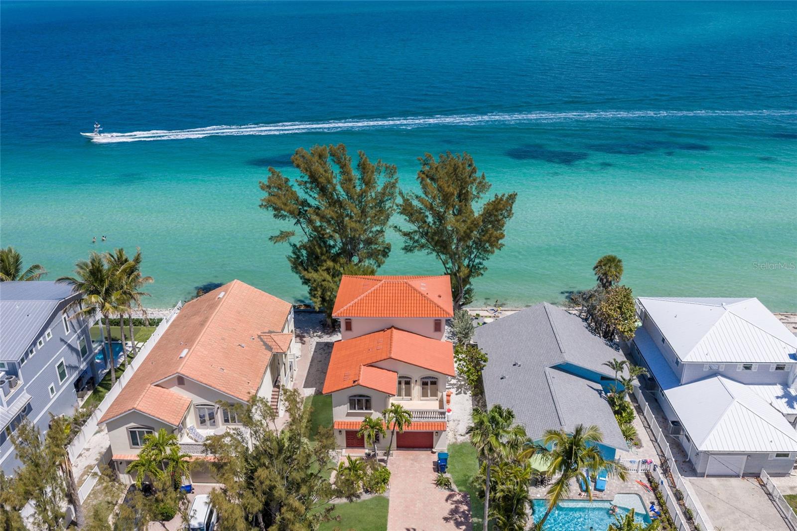 This Bayfront home is calling your name! Perfectly positioned directly on the bay, this 3-bedroom, 2.5-bathroom residence offers breathtaking water views from almost every window, inviting the serene beauty of Tampa Bay inside.
Step into an open, light-filled layout designed for relaxation and entertaining. The spacious interiors flow effortlessly, with generous living areas that frame panoramic bay vistas. Multiple balconies provide the ideal spots to savor morning coffee, sunrise, or the gentle bay breeze while watching dolphins play and boats glide by.
Long, private driveway and attached garage offering ample parking for family and guests. Whether you’re hosting a weekend getaway or enjoying everyday island life, there’s plenty of room for boats, cars, and more.
Just minutes from Anna Maria’s world-famous white-sand beaches, Pine Avenue’s charming shops and restaurants, this home combines privacy and convenience in one of the island’s most desirable north-end locations.
Experience true Florida waterfront living—where every day feels like a vacation. Don’t miss this rare opportunity to own a slice of paradise on Anna Maria Island!
