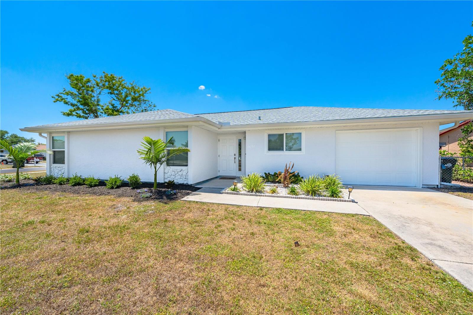 PRICE REDUCTION, 8.5% CAP RATE!!, Offered TURN-KEY FURNISHED, this property is fully fenced-in, on a corner lot and in desirable canal waterfront community. This home has been meticulously maintained inside and out, complemented by a freshly painted exterior and newly updated landscaping. Completely renovated in 2022, this Includes a new ROOF in 2022,New electrical panel, IMPACT RESISTANT windows and exterior doors; brand new luxury vinyl plank flooring throughout; all new lighting, interior doors, trim, and upgraded baseboards. The kitchen comes complete with all stainless steel appliances and Quartz Countertops.HVAC 2020. This home has been very successful used as a rental, and has substantial rental history to accompany it. This home is truly a complete package. This home is centrally located with easy access to world class golf courses and boating just moments away. With nearby access to Charlotte harbor and the famed Tarpon fisheries of Boca grande you will always be close to the sand and sea. Some of Florida's most prized and awarded beaches with powdery sand and crystal clear water are located just minutes away by car. Walk Venice beach every morning searching for seashells and sharks teeth. Enjoy the large pool and oversized outdoor space, with plenty of room for a gathering or cookout.