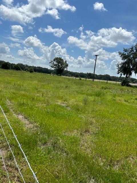 PRICE REDUCTION!!!  Reduced to Sell - Looking to build your dream home?  This is the acreage for you.  It is out in the country yet close enough to town.  These lots are hard to find with as much building that is going on in Florida. This lot has an easement that includes the road as shown in the picture.  The easement is for the two lots behind to have access to the road.  So, in the pictures, the lot line starts on the north side of the road and includes the road. This lot will not last long.  Buyer should verify all information with county records.  A copy of a survey is included in the photos to show property lines and easement access.