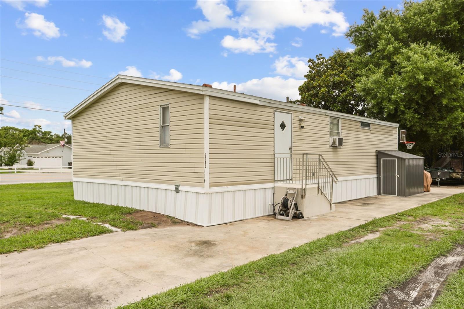 This is Your New Home! The property offers functional living space, outdoor flexibility, and convenient access to shops & restaurants. The extended driveway provides practical parking and everyday convenience. Inside, the home has been freshly painted! 2 Bedrooms + Bonus Room is ideal for 3rd Bedroom or Home Office!  The split-bedroom floor plan provides privacy and versatility. The primary suite includes a walk-in closet, and a remodeled en-suite bathroom. The backyard provides open space for outdoor enjoyment, pets, gardening, or future customization and and two detached sheds offering additional storage. Come see this Affordable Home Today!