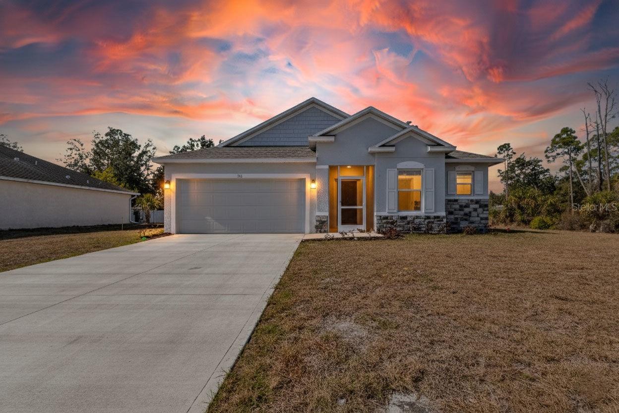 One or more photo(s) has been virtually staged. Welcome to 1111 S McDuff Street, positioned on an oversized corner lot in one of North Port’s growing areas.
This thoughtfully designed 3 bedroom, 2 bathroom home offers a bright, open floor plan that flows effortlessly from the kitchen to the dining and great room, creating a space that feels connected and comfortable for everyday living or entertaining. The modern white kitchen features stainless steel appliances, abundant cabinetry, generous counter space, and a large island ideal for gathering.


The split-bedroom layout provides privacy for the primary suite, complete with dual vanities and a spacious walk-in shower. Secondary bedrooms offer flexibility for guests, a home office, or additional family space. A dedicated laundry room adds convenience.



The oversized corner homesite is a true highlight, offering added depth and width with plenty of room to design your dream outdoor space. Imagine a future pool, outdoor kitchen, garden, or extended patio. The screened lanai is perfect for enjoying morning coffee or relaxed Florida evenings.

Located in a no HOA area of North Port near shopping, dining, parks, and major roadways, this home offers space, flexibility, and long-term potential in a community that continues to grow.

If you have been searching for a clean, move-in ready home with room to breathe and room to grow, this one deserves your attention.