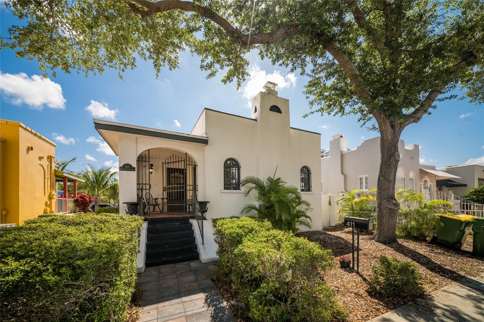 This iconic commercial/residential Burns Court bungalow, the ultimate live/work space, offers a rare opportunity to restore and personalize a truly unique downtown property in one of Sarasota's most coveted historic neighborhoods. The Burns Ct. facing 2-bedroom, 1-bath main residence features a private masonry-walled back courtyard leading to a large 1-bedroom, 1-bath detached unit. This unit, with frontage on Pineapple Avenue, is ideal for commercial or residential use, a guest apartment, private office/studio, small shop...
Located in the heart of nationally designated Historic Burns Court, one of downtown Sarasota’s most walkable neighborhoods, the property is just steps from an award-winning cinema, restaurants, boutiques, and the Bayfront, yet notably outside of a flood zone.
Many original architectural details remain intact, including decorative ironwork, moisture-resistant plaster walls, crown molding, and original hardwood floors. A beautiful, mature oak tree provides valuable shade and enhances the home’s historic charm. The home has excellent bones for a dream restoration project, the main house featuring a 2023 roof and 2019 HVAC.
Built-in equity: Zoned Downtown Core (DTC), the property includes confirmed transferable development rights (TDRs), which may be sold to a developer or investor thanks to a new historic preservation ordinance effective as of December 2025. 
Whether you envision creating a stunning live/work environment, generating income from a detached apartment, or designing an elegant commercial space, this charming property offers exceptional flexibility and historic character.