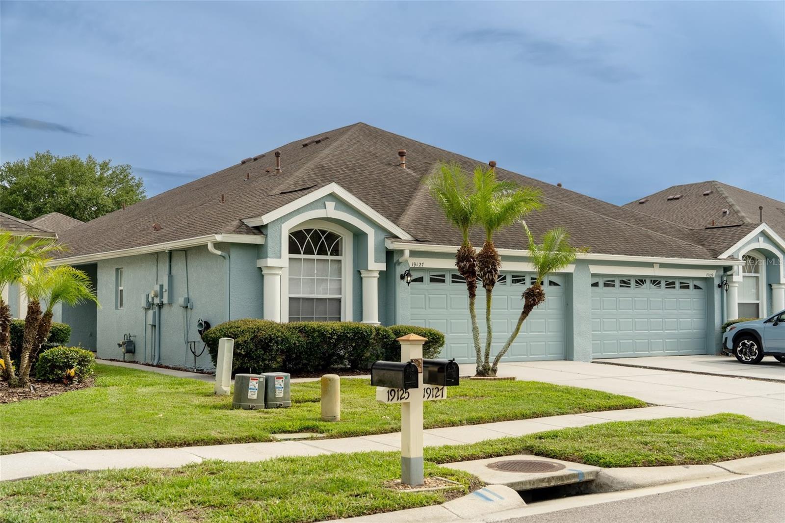 Lovely ONE OWNER Villa in Weymouth section of Oakstead Subdivision. This is the Charleston floorplan built by Tripp Trademark Homes.  The Charleston offers a foyer as you enter the home with a full bath and bedroom #2 on the right. Immediately to the right is the office/den that could be utilized as a 3rd bedroom with some modifications. The large kitchen has wood cabinets and Corian counters, closet pantry and eating space. The laundry closet is located in the kitchen and has both gas and electric dryer hookups. All Kitchen appliances will convey, the Water Softener is leased and can be transferred to the Buyers if wanted. The Great Room allows for Formal Dining and Formal Living or can be used as one large room to be utilized per Buyer's wishes.  The ensuite Primary Bedroom has Walk-In closet, Step In Shower and double sink vanity. The Covered and Screened Lanai gives a peacefulness to sit and enjoy your reading and relaxation time. The rear yard is fully fenced.  HOA for Weymouth includes Roof, building painting, yard and irrigation maintenance. Many amenities at the clubhouse including pool, tennis, workout facility, playground, basketball, pickleball and playground. A Beautiful home in a beautiful community.