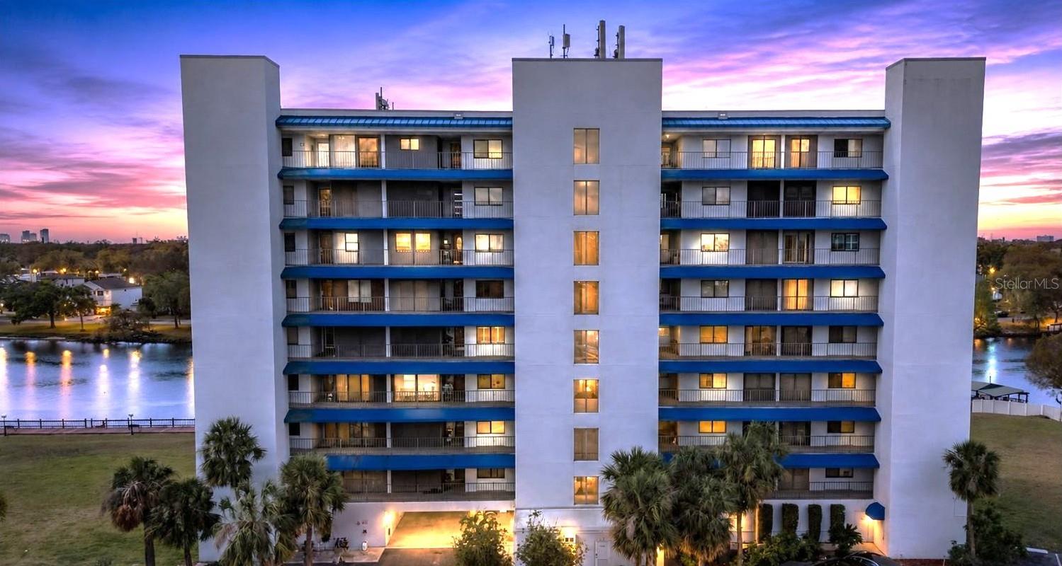 Perfectly located in the heart of Riverside Heights, this updated residence combines comfort, convenience, and city living with a peaceful riverfront setting. Just minutes from Armature Works, Tampa Riverwalk, Downtown Tampa, restaurants, breweries, entertainment, and major roadways, this location truly gives you the best of Tampa living.

Inside, you’ll find a bright and open split-bedroom floor plan designed for both everyday comfort and entertaining. The spacious living and dining area flows beautifully to the balcony through pocket sliding doors, allowing natural light and gorgeous water views to fill the home. The kitchen features quality finishes, including a dishwasher, induction range, and great cabinet space. The wet bar adds the perfect touch for hosting guests.

The sellers have also made thoughtful improvements, including new recessed lighting and fresh interior paint throughout, giving the condo a clean, modern, and move-in ready feel.

The primary suite is generously sized and includes a bonus sitting area, perfect for a home office, reading space, workout area, or quiet retreat. The ensuite bathroom features dual sinks and a modern walk-in shower. Two additional bedrooms plenty of space for guests, family, or flexible use.

Storage is abundant throughout the condo, with shelving systems in the primary walk-in closet and outdoor utility closet, plus an additional private storage space on the ground floor for seasonal items, bikes, paddleboards, or outdoor gear.

The riverfront community offers incredible amenities, including a waterfront pool, clubhouse, tennis courts, green space, and a dock where you can launch a canoe or paddleboard, enjoy a peaceful walk, or simply take in the river views.

The HOA fee includes cable, internet, sewer, water, hot water, and trash, adding convenience and value.

This is a rare opportunity to enjoy waterfront living with city convenience in one of Tampa’s most desirable locations. Schedule your private showing today and experience the views for yourself.