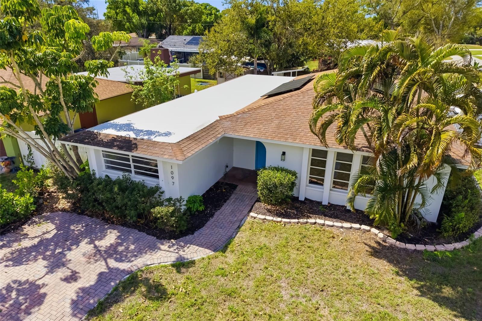 Virtually Staged. Looking for space, flexibility, and freedom without HOA restrictions? This 4-bedroom, 2-bath Sarasota pool home offers exactly that. The backyard is built for enjoying Florida living, featuring a private pool, tiki hut, outdoor entertaining space, and a storage shed for added functionality. Whether you're hosting friends, relaxing by the water, or simply enjoying the sunshine, this outdoor setup creates a true backyard retreat. The front and side yard also offer a ton of activity space due to the corner lot positioning. 

Inside, the home offers a spacious and adaptable layout with multiple living areas that can easily be tailored to your needs. Create a formal dining area, home office, media room, playroom, or additional lounge space depending on your lifestyle. The kitchen has been updated with granite countertops, refreshed cabinetry, and newer appliances, blending practicality with a clean modern feel.

The home also features solar panels to help offset electric costs, plus a newer well and septic system for added peace of mind and efficiency.

Conveniently located near UTC Mall, Downtown Sarasota, Nathan Benderson Park, Bobby Jones Golf Club, Siesta Key Beach, shopping, dining, dog parks, sports fields, and everyday essentials, this property combines accessibility with the flexibility that’s becoming harder to find in Sarasota.

If you’ve been searching for a pool home with room to spread out and fewer restrictions, this is an opportunity worth seeing.