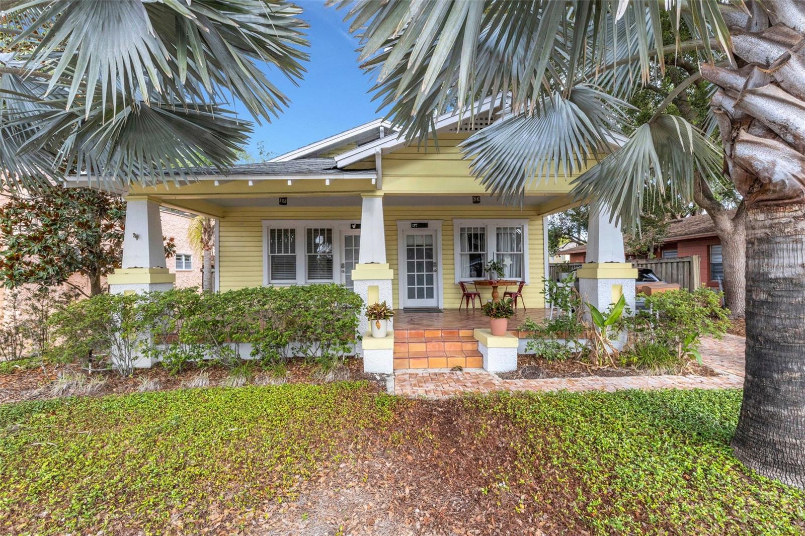 Rare opportunity in the highly desirable Lake Morton Historic District! This charming 1925 shotgun bungalow/duplex offers the perfect blend of historic character, in-town convenience, and investment potential in one of Lakeland’s most sought-after locations. Live in one side and rent the other—Unit 833 is currently leased through 8/31/2026—making this an ideal owner-occupant, multigenerational, or income-producing opportunity.

Ideally situated on a picturesque one-way brick street, this property places you just moments from Lake Morton, Lake Hollingsworth, Florida Southern College, the Lakeland Public Library, The Ashley Gibson Barnett Museum of Art, coffee shops, restaurants, boutique shopping, and all that Downtown Lakeland has to offer.

Built in 1925 and offering approximately 1,764 total square feet under the roof (approximately 882 square feet per side), both units feature much of their original charm along with thoughtful updates for modern living. A welcoming rocking-chair front porch sets the tone, while inside each unit offers 2 bedrooms, 2 bathrooms, separate living areas, updated kitchens with white wood cabinetry, granite countertops, stainless steel appliance packages, stackable washers and dryers, ceramic tile flooring throughout for easy maintenance, tankless hot water heaters, and separate utility meters.

Unit 835 is considered a 2-bedroom home, with one bedroom lacking a closet, while the second bedroom features a large walk-in closet, private entrance, and updated ensuite bath with walk-in shower—offering flexibility for guests, roommates, or a private home office setup. Additional updates include new A/C systems for both units, a new refrigerator and newer dishwasher in Unit 835, and a new dishwasher in Unit 833.

Outdoor spaces are equally inviting, featuring a brick driveway on one side, brick walkway on the other, and a spacious rear brick terrace offering room for seating, entertaining, or open parking, plus a small storage shed and irrigation system. Whether you are looking for a historic in-town residence, investment opportunity, or flexible live/work lifestyle, this unique property delivers location, charm, and versatility. Welcome home!