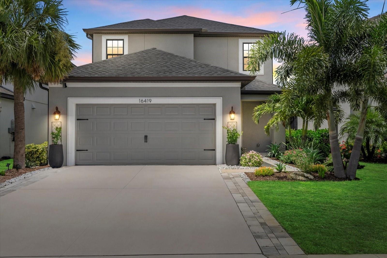 This 5-bedroom, 3.5-bath home with a den and loft is located in the desirable Park East community at Azario in Lakewood Ranch. The spacious floor plan features high ceilings, 8-foot doors, and a first-floor primary suite with an ensuite bath. Also on the main level is a dedicated den/office space.

Upstairs includes a loft, a large bonus room/5th bedroom and three additional bedrooms, including one with a private ensuite bathroom.

The gourmet kitchen offers white cabinetry, a breakfast bar, apron sink, under-cabinet lighting, glass-front accent cabinets with a pull-out bar shelf, pull-out drawers beneath the gas cooktop, and soft-close cabinets and drawers throughout.

Upgrades include 5-inch baseboards, metal stair railings, a glass front door, and enhanced tile, counters, and flooring. Additional features include insulated garage doors, added laundry room cabinetry, and window trim in the dining room and primary bedroom.

Sliding pocket doors lead to a private, fenced backyard with upgraded landscaping and room to add a pool.

Park East offers resort-style amenities including a community pool, volleyball and basketball courts, dog parks, sports fields, and playgrounds. Conveniently located near Lakewood Ranch shopping and dining, UTC, I-75, and Sarasota’s award-winning beaches. Zoned for the new Lake Manatee K-8 school.

Schedule your private tour today.