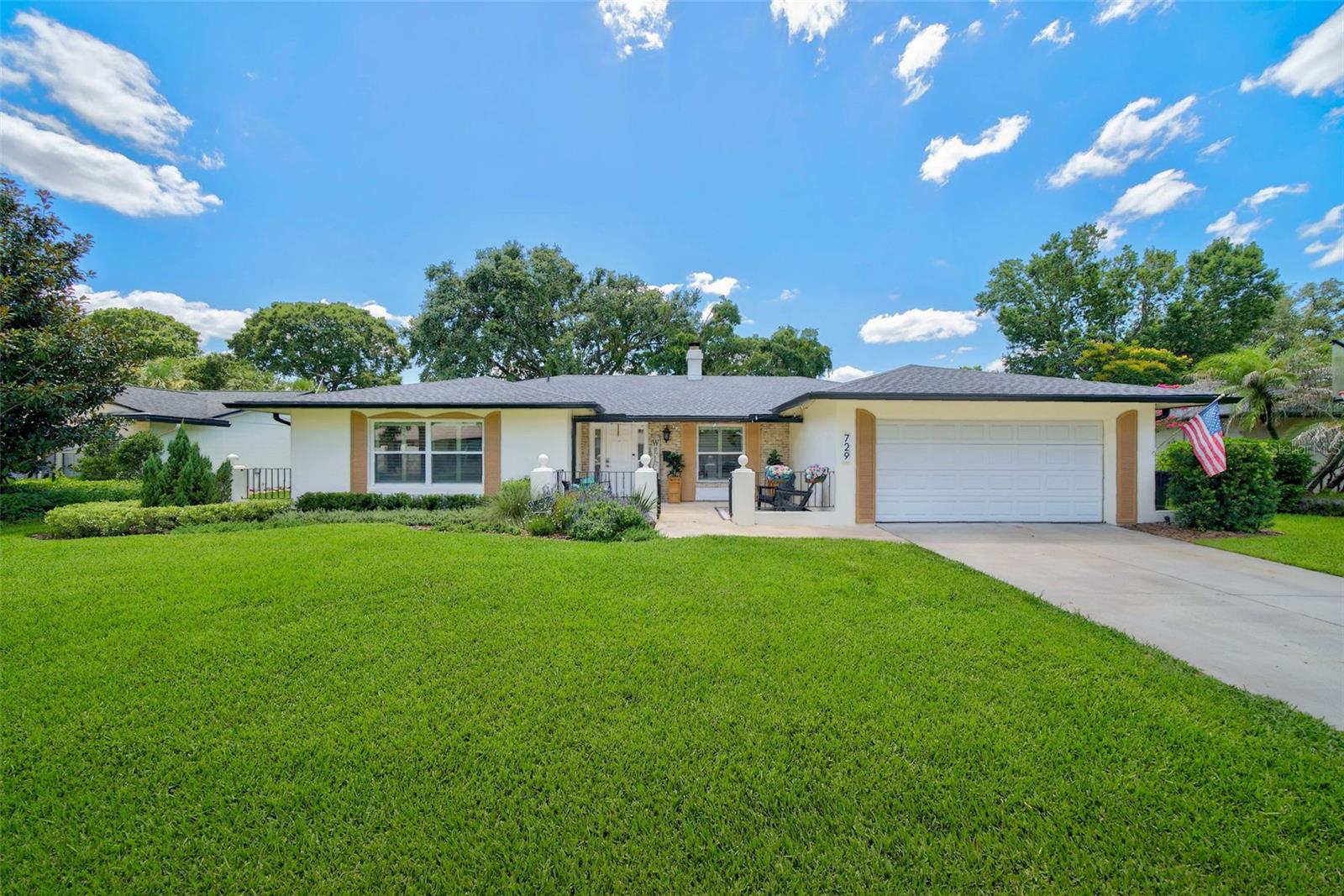 Completely reimagined with an extensive top-to-bottom renovation, this stunning four-bedroom, three-bathroom pool home offers over 2,300 square feet of beautifully curated living space in one of Winter Park's most desirable locations. Every detail was thoughtfully selected to blend timeless design with modern functionality, creating a truly move-in-ready home.  Inside, large wood-look plank tile flooring installed throughout in 2024 creates a seamless flow, complemented by recessed lighting, plantation shutters, all-new designer lighting and ceiling fans, and energy-efficient windows replaced in 2024. A cozy wood-burning fireplace provides character to the beautiful living space while French doors installed in 2024 provide effortless access to the outdoor living space. Additional upgrades completed in 2024 include blown-in insulation and a gas tankless water heater.  The showstopping kitchen was completely remodeled in 2024 and is designed to impress. Custom hardwood cabinetry accented with elegant gold hardware is paired with luxurious quartz countertops and a dramatic full-height quartz backsplash. A large center island with seating for four, a black farmhouse sink, pot filler, and abundant prep space make this kitchen equally suited for everyday living and entertaining.  Split from the secondary bedrooms for added privacy, the spacious primary suite is a peaceful retreat featuring French doors leading directly to the pool, a dedicated makeup vanity, walk-in closet, and a beautifully renovated ensuite bathroom with a double vanity and an oversized tiled shower enclosed by frameless glass. All three bathrooms were tastefully remodeled in 2024 with timeless, high-end finishes.  The oversized laundry room is as functional as it is attractive, offering built-in cabinetry for exceptional storage along with an included washer and dryer.  Step outside to your own private backyard oasis situated on a beautifully landscaped .26-acre lot. The screened in-ground pool was resurfaced with mini pebble finishes in 2025, while a custom flagstone outdoor shower with a decorative rock bed creates a true resort-inspired atmosphere. Additional exterior improvements completed in 2024 include new exterior doors, gutters, French drains, and an updated two-car garage featuring epoxy flooring along with new torsion springs and rollers.  Ideally located just minutes from UCF, Rollins College, Full Sail University, AdventHealth Winter Park, the Crosby Wellness Center, Winter Park Pines Golf Club, and the Cady Way Trail, residents also enjoy access to Cady Way Park with its community pool, playground, beach volleyball courts, tennis courts, and pickleball courts. Zoned for highly rated Aloma Elementary, Glenridge Middle School, and Winter Park High School, this exceptional home combines a remarkable renovation with an unbeatable Winter Park lifestyle. ROOF - 2024 HVAC - 2024 ELECTRICAL - 2024 PLUMBING - 2024 TANKLESS WATER HEATER - 2024