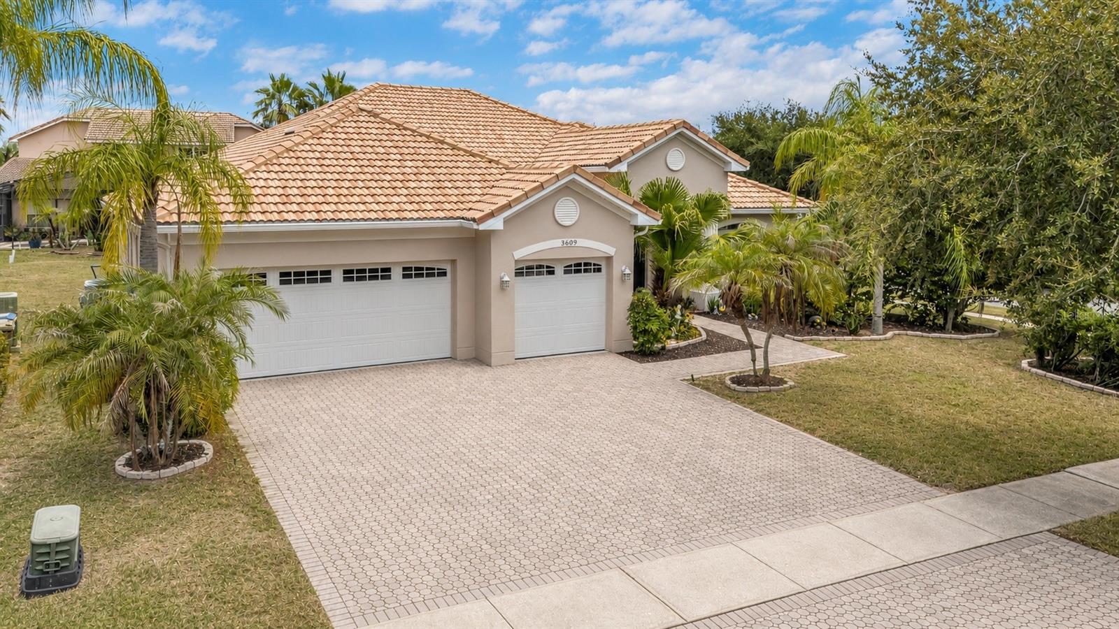 Welcome to this beautifully maintained home in the highly desirable, gated community of Bellalago! This spacious residence offers the perfect combination of comfort, style, and Florida living. From the moment you arrive, you'll appreciate the exceptional curb appeal featuring mature tropical landscaping, a paved driveway, and a durable tile roof that not only enhances the home's beauty but can last up to 75 years with proper maintenance.

Inside, you'll find a thoughtfully designed floor plan with generous living spaces, abundant natural light, and plenty of room for entertaining or relaxing with family and friends. The well-appointed kitchen flows seamlessly into the main living areas, while the spacious bedrooms provide comfort and privacy for everyone. Enjoy added peace of mind knowing the A/C system was replaced in 2023, providing improved energy efficiency and reliable comfort for years to come.

Step outside and enjoy your private outdoor space, perfect for morning coffee, weekend barbecues, or simply unwinding after a long day. Living in Bellalago means embracing a true resort-style lifestyle. Residents enjoy access to an impressive array of amenities, including a stunning clubhouse, resort-style swimming pools, a state-of-the-art fitness center, tennis courts, basketball courts, scenic walking and biking trails, multiple parks and playgrounds, a dog park, and an on-site restaurant overlooking the lake. Whether you're staying active, spending time with family, dining with friends, or simply enjoying the beautiful surroundings, Bellalago offers something for everyone.

Conveniently located near shopping, dining, schools, medical facilities, and major roadways, this home offers easy access to everything Central Florida has to offer while being nestled in one of Kissimmee's premier communities. Don't miss this incredible opportunity to own a move-in-ready home with timeless features, major system updates, outstanding community amenities, and exceptional long-term value. Schedule your private showing today!