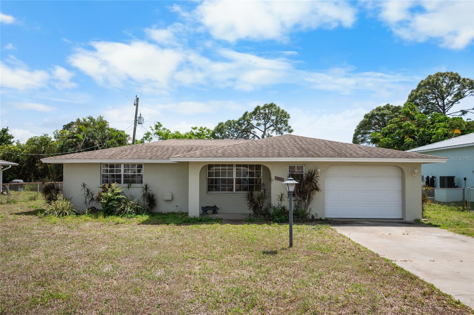 Live the Florida coastal lifestyle with a rare sense of privacy, tranquility, and direct connection to nature in the heart of Venice. This inviting home is perfectly positioned for those who value peaceful surroundings, featuring a SCREENED-IN REAR LANAI where you can unwind to the sounds of rustling trees and flowing water. Enjoy a FULLY FENCED YARD offering a secluded space to relax, entertain, garden, or let pets roam freely. A natural BACKYARD BUFFER enhances the sense of privacy, creating a quiet, tucked-away setting that feels worlds away from the everyday.***Just beyond your backyard, a shallow waterway winds through a natural habitat filled with local wildlife, offering a constantly changing, serene view. This peaceful water empties directly into the nearby South Venice Lemon Bay Preserve and eventually connects to the Intracoastal Waterway—giving you a rare opportunity to live alongside protected nature while still being close to everything.~~~The home showcases BAHAMA SHUTTERS, a distinctive HIP ROOF DESIGN and a comfortable, functional layout, paired with numerous thoughtful UPDATES. Recent improvements include newer appliances, well pump, holding tank, aerator, water softener, central air conditioner, bathtub with shower diverters, hot water heater, kitchen reverse osmosis system, and electrical panel—providing peace of mind and carefree living. FURNISHINGS ARE NEGOTIABLE, making this a seamless move-in-ready option.***Located in the laid-back South Venice community, you’re just MINUTES FROM MANASOTA BEACH, where you can enjoy uncrowded shoreline walks, hunt for shark teeth, and take in breathtaking Gulf sunsets. Residents also have the option to join the South Venice Civic Association, offering access to A PRIVATE FERRY TO A SECLUDED BEACH AND A BOAT RAMP, making it easy to get out on the water whenever you choose.~~~With NO HOA RESTRICTIONS, a peaceful neighborhood setting, and nature right outside your door, this property offers a lifestyle that’s increasingly hard to find—quiet, private, and deeply connected to the natural beauty of coastal Florida. Call today to experience it for yourself.