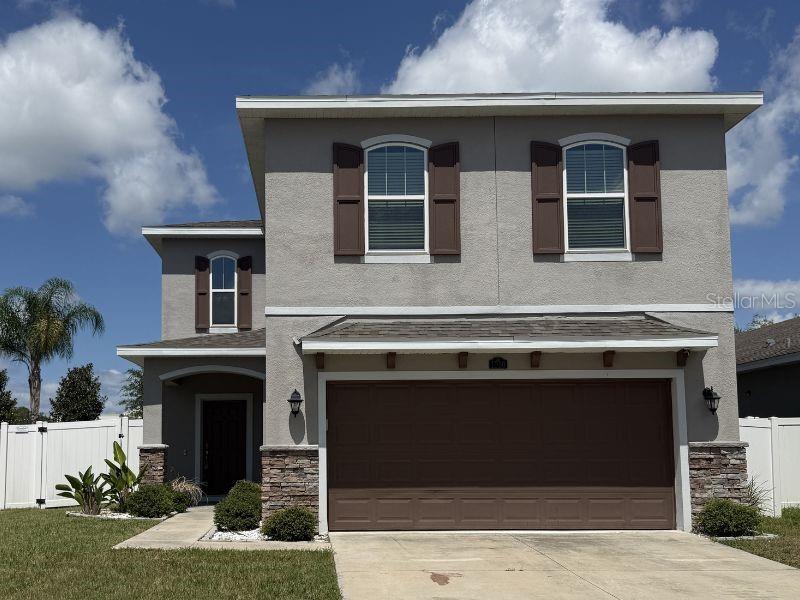 Short Sale. All of the home's major components are in excellent condition, providing peace of mind for its next owner. The property could benefit from a thorough cleaning and a little cosmetic TLC, it offers a fantastic opportunity for someone to add their personal touch and make it truly feel like home. Built in 2019, this  two-story home offers over 2,000 square feet of thoughtfully designed living space with 3 bedrooms, 2.5 bathrooms, and a spacious 2-car garage. The open-concept first floor is perfect for entertaining, seamlessly connecting the living, dining, and kitchen areas while providing plenty of natural light throughout.
The modern kitchen features ample cabinetry, generous counter space, a breakfast bar, and making meal preparation and gatherings effortless. Upstairs, escape to the oversized primary suite complete with a large walk-in closet and a private ensuite bath featuring dual vanities, a relaxing soaking tub, and a separate shower. Two additional bedrooms, a full guest bathroom, and an upstairs laundry room provide comfort and convenience for family and guests alike. 
Step outside to enjoy the fully fenced backyard—ideal for pets, play, or weekend barbecues—with plenty of room to create your own outdoor oasis.
Conveniently located just minutes from shopping, restaurants, medical facilities, parks, and schools, with easy access to The Villages, Leesburg, and major highways, this home offers the perfect combination of modern living and everyday convenience. Whether you're searching for your first home, your next family home, or an excellent investment opportunity, this property is one you won't want to miss.
