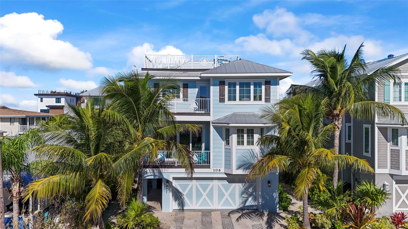 Escape to paradise with this remarkable beach house that boasts breathtaking views of the Gulf of Mexico! This fully turnkey home is an investors/2nd homeowners dream! This home has track record of massive rental income! This home has been seen to bring in over $350,000 gross income in a single year when fully available to rent. Not only are you steps away from the beach but you are also a short walk to the popular Bridge Street with tons of restaurants/bars/shopping/nightlife. On top of all this there is a day dock a few steps away to park a boat or jet skis! Experience the spaciousness of an open floor plan that seamlessly blends indoor and outdoor living. Dive into luxury with an incredible pool featuring a thrilling waterslide. Enjoy a lifestyle filled with sunsets, sea breezes, and the joy of coastal living. Whether you are looking for a getaway or a lucrative investment, this is the property you’ve been waiting for. Join us for an exclusive viewing to witness the allure of coastal living. (Please note this is a very active vacation rental home and showing may be hard on some days.)