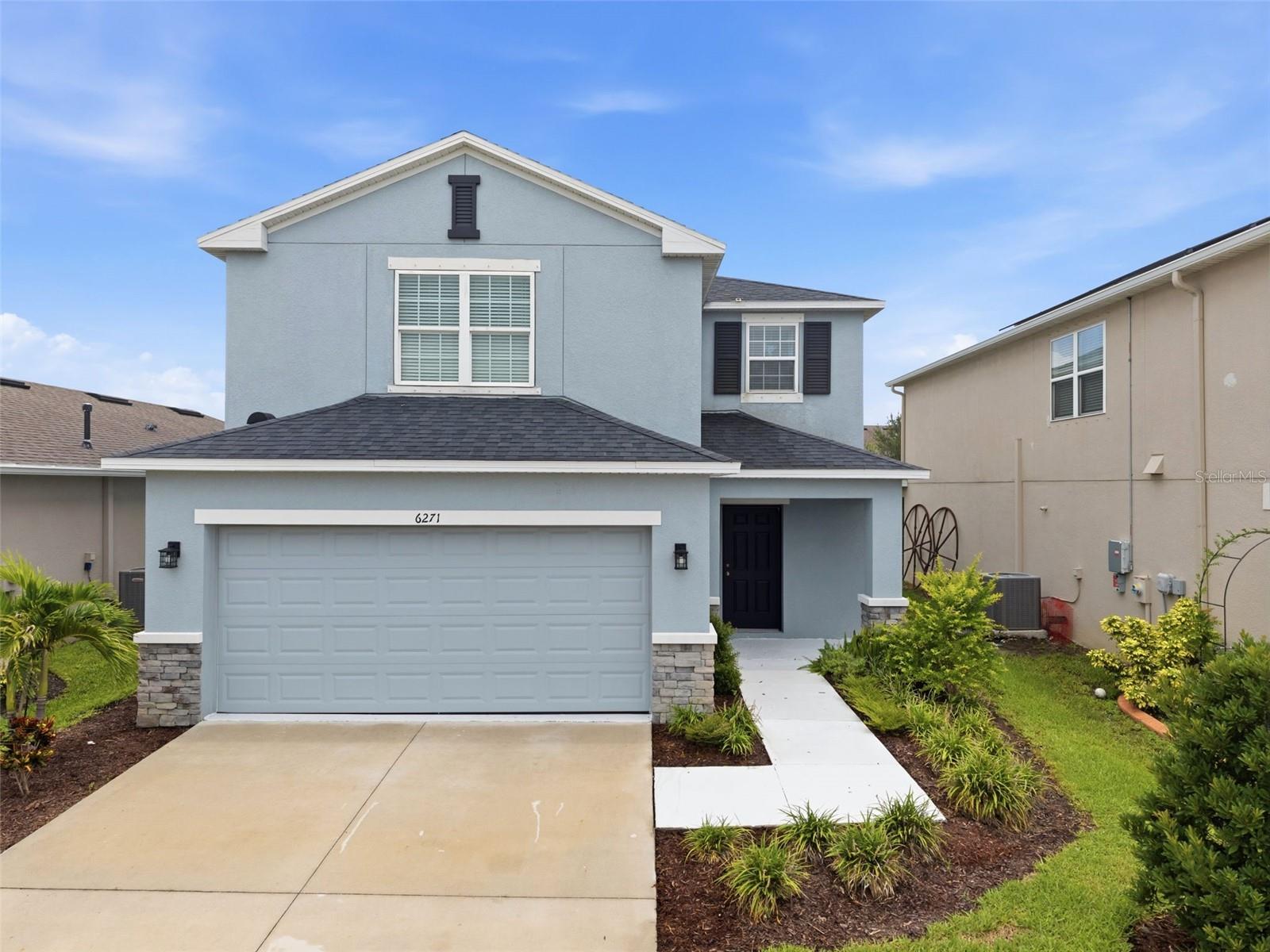 Welcome home to this beautifully updated 3 bedroom, 2.5 bathroom home in the highly desirable Artisan Lakes community. Built by Taylor Morrison, this spacious two-story home offers an open floor plan designed for comfortable, everyday living and effortless entertaining.

The heart of the home is the updated kitchen, featuring modern finishes, ample cabinet space, a large center island, and a seamless connection to the expansive living and dining areas. Updated tile flooring throughout the main living spaces adds both style and durability, while large windows fill the home with natural light. Upstairs, you'll find generously sized bedrooms, including a spacious primary suite with a custom walk-in closet designed for exceptional organization.

Residents of Artisan Lakes enjoy resort-style amenities including a clubhouse, fitness center, swimming pool and spa, pickleball and tennis courts, basketball courts, playgrounds, dog parks, and miles of walking trails. Conveniently located near shopping, dining, I-75, Tampa, St. Petersburg, Sarasota, and Gulf beaches, this move-in ready home offers the perfect combination of space, modern updates, and an exceptional community lifestyle.