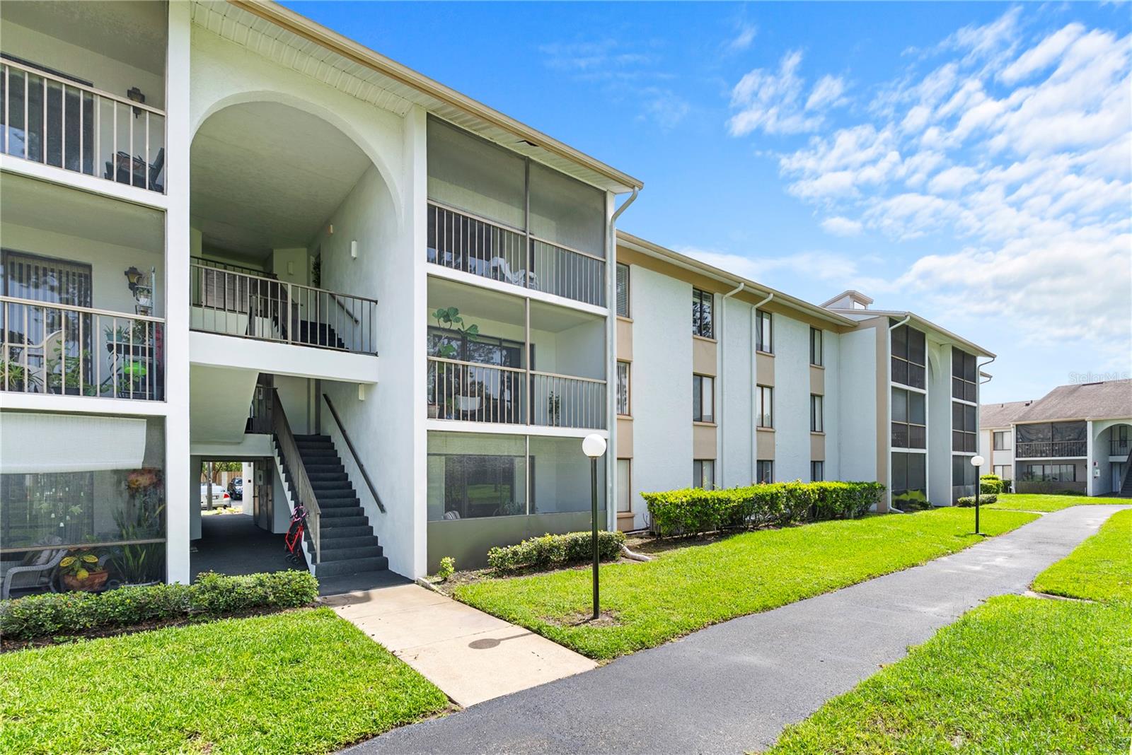 Welcome to Club at Orlando, a well-maintained gated condominium community offering comfort, convenience, and beautiful garden views. This desirable first-floor unit enjoys a peaceful setting with a spacious screened porch overlooking a picturesque manicured green space.
Inside, you’ll find a bright and open floor plan designed for easy everyday living. The kitchen has a seamless flow to the living area which creates an ideal space for relaxing or entertaining. Additional highlights include a balcony space ideal for sitting and relaxing with a coffee, an interior laundry room, and abundant natural light.
Perfectly positioned near Orlando International Airport, this home also offers easy access to major highways including the 408, 417, and 528, placing Downtown Orlando, Lake Nona Medical City, world-class attractions, and Florida’s beautiful beaches within easy reach.