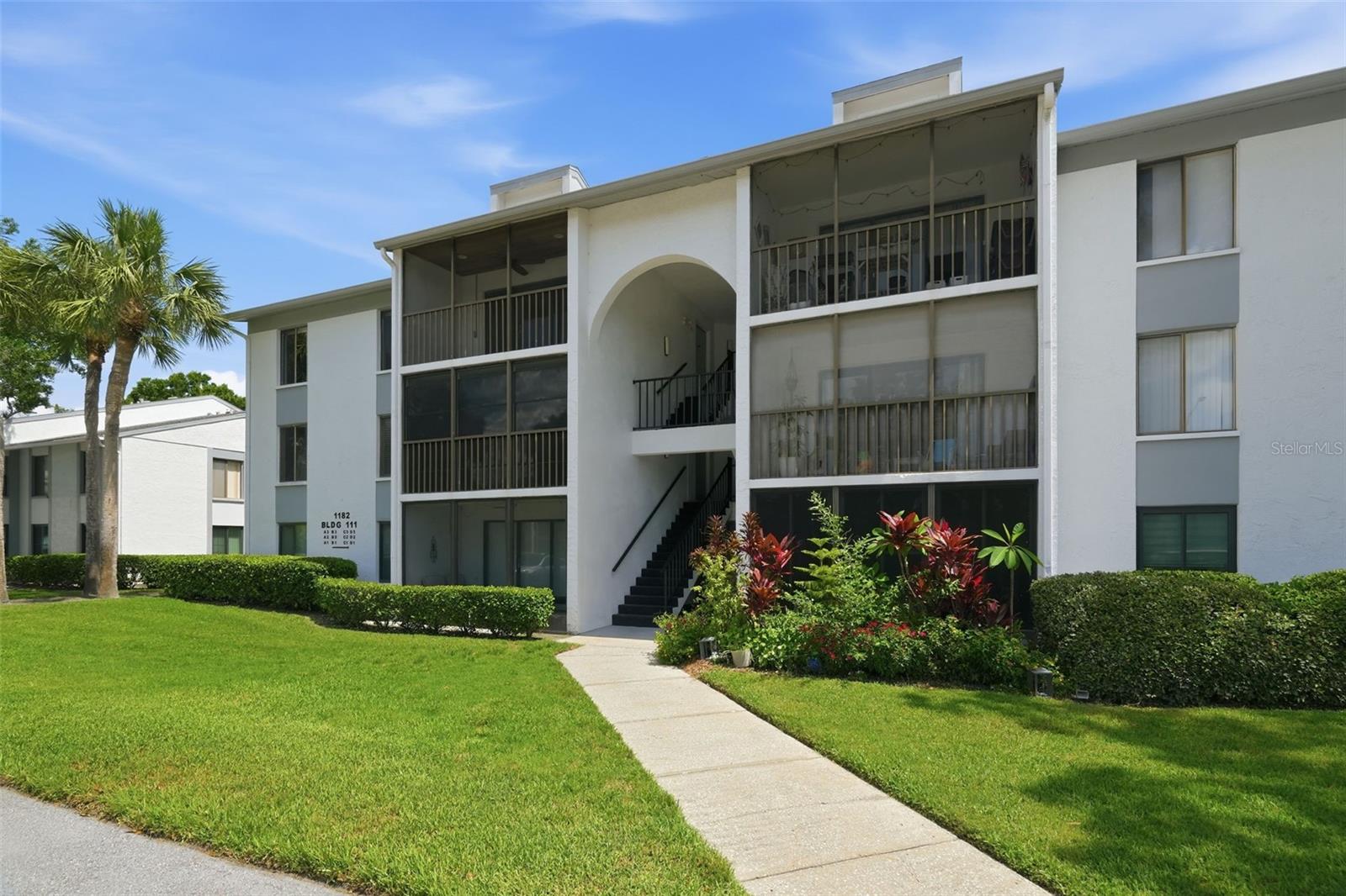 Welcome to Pine Ridge at Lake Tarpon! This clean and well-maintained THIRD-FLOOR condo offers comfortable Florida living in a peaceful community surrounded by mature landscaping and scenic lakes. Inside, you’ll find easy-care TILE and LUXURY VINYL flooring throughout, a spacious living and dining area, and a functional kitchen conveniently positioned just off the main living space. The open living area extends to a Cypress COVERED AND SCREENED PATIO, providing the perfect spot to enjoy your morning coffee, unwind at the end of the day, or simply enjoy the Florida weather.

Pine Ridge at Lake Tarpon offers a variety of community amenities, including a sparkling COMMUNITY POOL, TENNIS COURTS, CLUBHOUSE, WALKING TRAILS and peaceful outdoor spaces. The condo fee includes WATER, SEWER, TRASH, INTERNET through Spectrum, and exterior maintenance, helping make everyday living simple and convenient. Reserved parking plus additional guest parking is available. Conveniently located near shopping, dining, recreation, and major roadways, this condo offers an excellent opportunity to enjoy the Tarpon Springs and East Lake area. Schedule your private showing today!