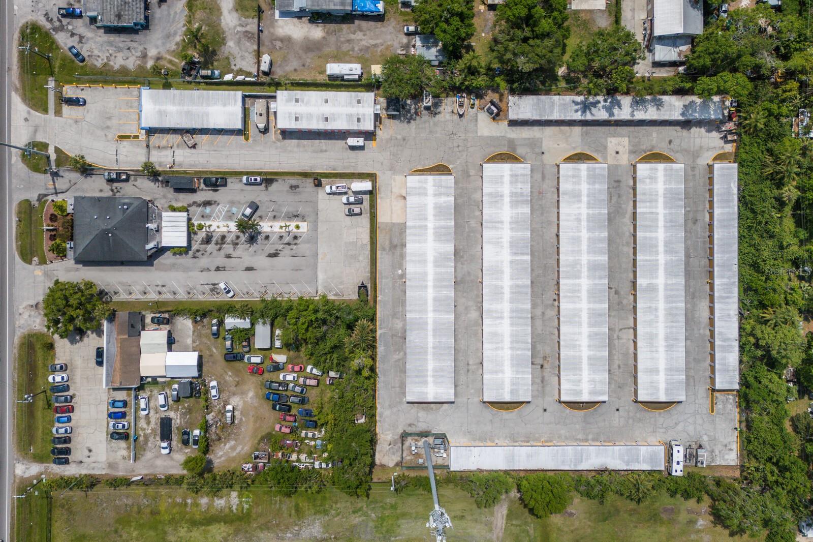 9 concrete building self-storage facility in active area of Manatee County. Over 3 acres of prime commercial property.  Currently 2 office spaces with possibly for an additional office space. Self-Storage units include 144 units 10x20; 36 units 10x10; 20 units 20x20; various other sizes equaling 265 Units in total PLUS 16 parking spaces. In addition, there is a cell tower leased on the property.  New Roof, 2023 Replace downspouts and gutters, Painted 2023, Paving 2023. Great location!