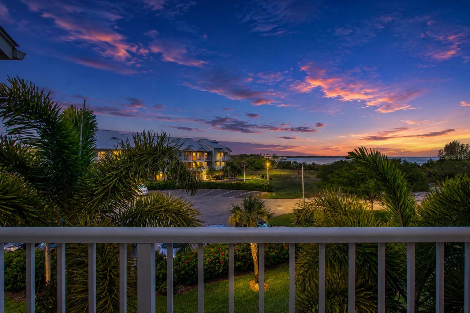 WATERFRONT town home w/ metal roof, concrete construction and 4 spacious terraces to enjoy year round indoor/outdoor living in the seaside village of Little Harbor.  This destination resort type lifestyle offers an on-site white sand and secluded BEACH, 2 waterfront restaurants/sports/tiki bar, newly constructed fishing pier and private outdoor seating area with a fire feature, heated swimming pool, tennis courts, pickle ball courts, clubhouse with fitness center, 2 deep water marinas, high & dry storage w/ slip availability. BOATERS paradise- direct access to the Bay/Gulf-no lifts or bridges. Freedom Boat Club on-site. Nature enthusiasts use the recently constructed community boat launch for canoeing/kayaking on the RIVER & canals, while enjoying dolphin and manatee sightings. Of course, with the location of this particular town home you never have to leave home to enjoy manatee and dolphin sightings. It is literally Manatee Haven with as many as 10-25 sightings per day as these gentle giants frolic and entertain just feet from your terrace as you watch in wonder and delight! Enjoy an Eco Tour in the afternoon or a Sunset Cruise aboard the Latitudes Pontoon with or without a dining option. Additional water sports include Paddle boards and Jet Ski's available for rent. FISHING mecca with a multitude of fishing charter selections or fish directly off the recently completed amazing community Pier. Great primary or secondary home or investment with minimum rentals being daily - perfect for AIRBNB. Highly desirable location to enjoy the breathtaking sunsets. The town home's recent upgrades include luxury vinyl plank on both the stairway as well as the second floor, new living room furniture, along with the refrigerator, dishwasher, stackable washer/dryer and A/C being nearly new at less than a year old. This move-in ready home awaits the next fortunate owner with its inviting beach design vibe while providing the ultimate in comfort and relaxation. As a bonus, additional entertaining space provided in garage with dining table, chairs and mounted TV. Convenient location-approximately half hour drive to Tampa, St. Petersburg, and Sarasota. Shopping, hospitals, restaurants, & golf courses all nearby. The taxes include the CDD. Don't miss out on this immaculately kept home - call TODAY to schedule an appointment!