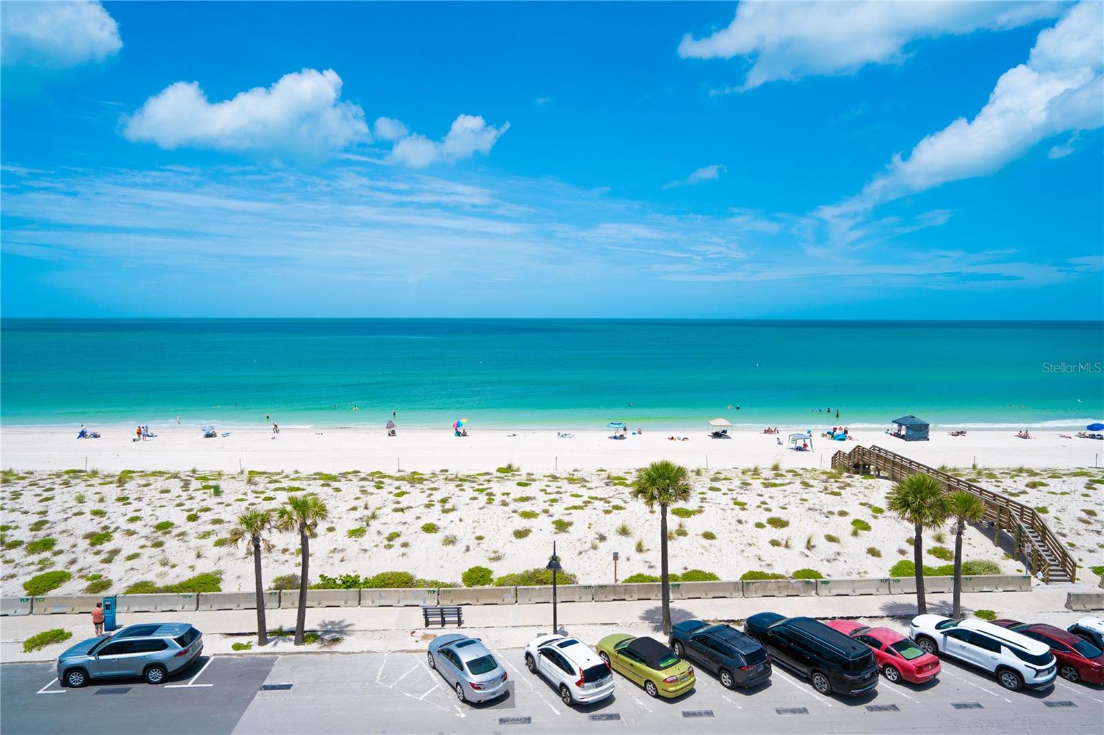 Wake up to breathtaking, unobstructed Gulf views from this rare and highly sought-after beachfront residence in the heart of Pass-a-Grille. Perched on the 6th floor, this beautifully updated 2-bedroom, 2-bath condominium offers 1,340 square feet of refined coastal living with spectacular 180-degree panoramic water views stretching as far as the eye can see.

One of the few residences of its kind, this upscale modern condominium seamlessly blends luxury, comfort, and the laid-back elegance of Florida's Gulf Coast. The open-concept floor plan features a bright and airy living space, an updated kitchen with quartz countertops, stainless steel appliances, and a large island perfect for entertaining family and friends. The spacious primary suite serves as a private retreat with stunning water views and an updated en-suite bath, while the generous guest bedroom and second full bath provide comfort and privacy for visitors.

Step onto the enclosed balcony and experience unforgettable sunsets over the Gulf of Mexico, watch dolphins play in the surf, and enjoy the soothing sounds of the waves from your own private oasis. Thoughtfully updated throughout, this move-in-ready residence showcases coastal-inspired finishes, luxury tile flooring, and abundant natural light from nearly every room.

Located in the highly desirable Pass-a-Grille community, you're just steps from sugar-sand beaches, charming boutiques, waterfront dining, historic 8th Avenue, and all the attractions of St. Pete Beach. With a 30-day minimum rental policy, this property also offers excellent income-producing potential, making it an ideal full-time residence, vacation retreat, or investment opportunity.

Rarely available and impeccably positioned, this exceptional waterfront condominium delivers the ultimate Florida beach lifestyle with luxury, convenience, and unmatched Gulf-front views.