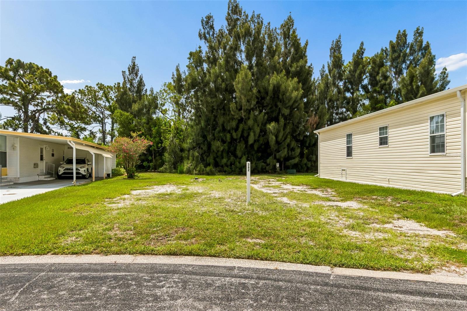 Build the Florida home you've always dreamed of on this rare vacant lot in the highly sought-after Clearwater Cascades, a resident-owned 55+ five-star community. This prime homesite offers the perfect opportunity to design a brand-new manufactured home in one of Clearwater's most desirable active adult communities. This Lot is cleared and ready for you to start your new Florida Lifestyle. Enjoy no rear neighbors with this exceptional spot.

Enjoy an exceptional resort-style lifestyle with outstanding amenities, including two heated swimming pools, a relaxing hot tub, sauna, spacious clubhouse, fitness center, and shuffleboard courts. The community also features a full calendar of social events and activities, making it easy to meet neighbors and stay active year-round.

Conveniently located just minutes from shopping, restaurants, medical facilities, golf courses, and the beautiful Gulf Coast beaches, Clearwater Cascades offers the perfect blend of relaxation and convenience. Whether you're looking for a seasonal retreat or your forever home, this is a fantastic opportunity to own land in a resident-owned community where you can enjoy the very best of the Florida lifestyle.
