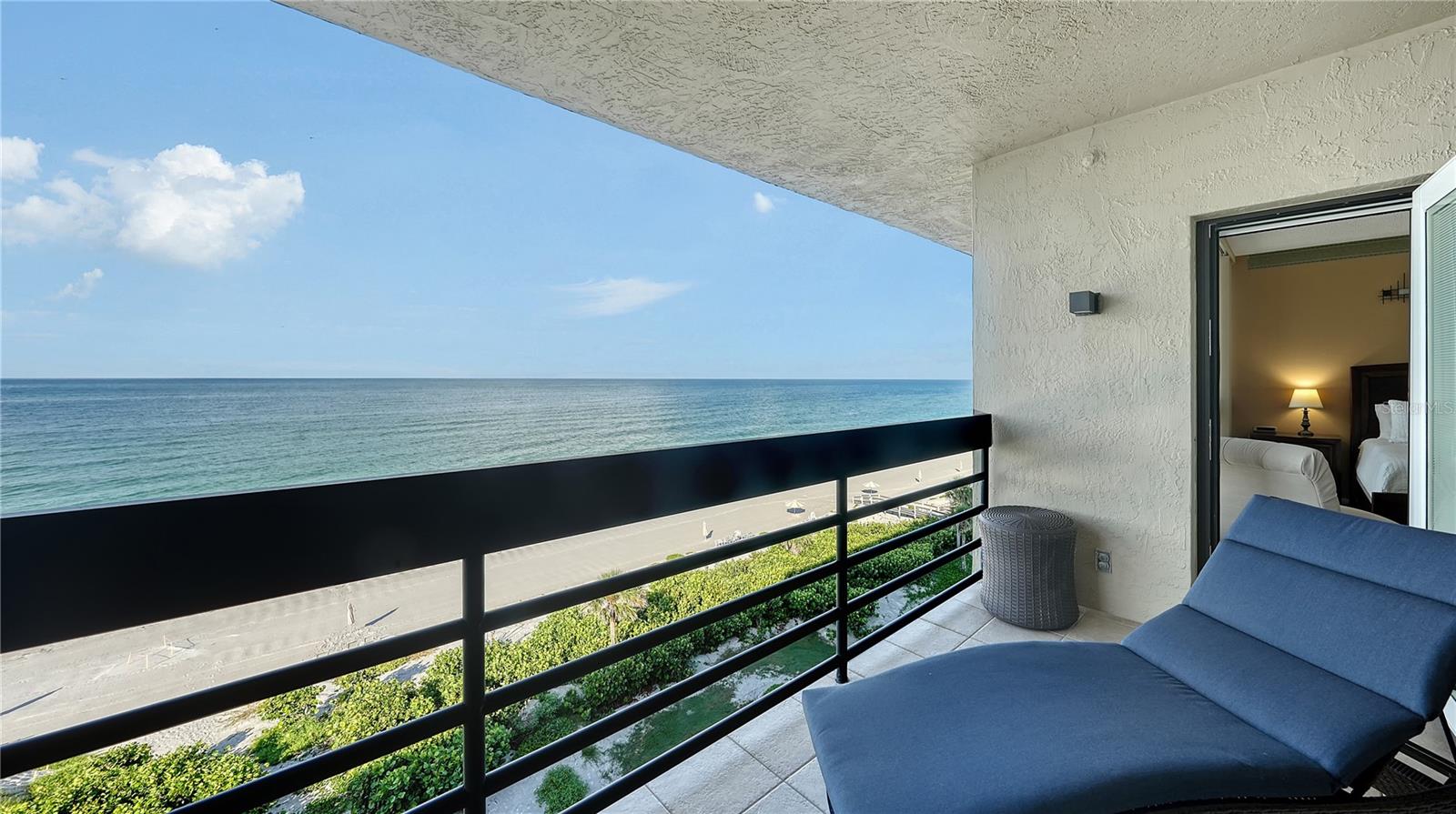 This direct Gulf-front residence at Beachplace offers an extraordinary opportunity to enjoy the very best of Longboat Key’s beachfront lifestyle. Perfectly positioned to capture unobstructed views of the Gulf of Mexico, this furnished two-bedroom home combines a serene coastal retreat with strong rental potential—producing an average of $70,000 annually in gross rentals. Whether you envision it as your move-in-ready getaway, a property to personalize, or an income-producing property, the possibilities here are unmatched. From the moment you step inside, natural light fills the open floor plan. The welcoming foyer flows into a spacious living and dining area, framed by newer impact-rated walls of glass that extend to the private terrace. This expansive beachfront balcony is a highlight of the home, offering front-row seats to breathtaking sunsets, the sound of gentle waves, and refreshing Gulf breezes. The split-bedroom layout is designed for comfort and privacy. The primary suite enjoys direct terrace access, a large closet, and an en-suite bath with dual vanities. The guest bedroom is equally inviting and privately situated, ideal for hosting family or visitors. Additional features include tile flooring throughout, a well-appointed granite kitchen, and deeded parking—adding everyday ease for seasonal or year-round living. Life at Beachplace feels like a private resort. This sought-after community offers residents 24-hour staffed security, on-site management, a clubhouse perfect for a lively escape, along with Har-Tru tennis courts, a modern fitness center, and heated swimming pool with spa. Pristine beachfront access and lushly landscaped grounds create the ultimate Florida lifestyle. Located on the southern end of Longboat Key, Beachplace provides unmatched convenience. You’re just minutes from the Longboat Key Club’s golf and tennis facilities, the boutique shops and dining of St. Armands Circle, and the vibrant cultural venues of downtown Sarasota—including theaters, galleries, and waterfront parks. From beachside relaxation to world-class dining and entertainment, everything that defines Sarasota living is within easy reach.