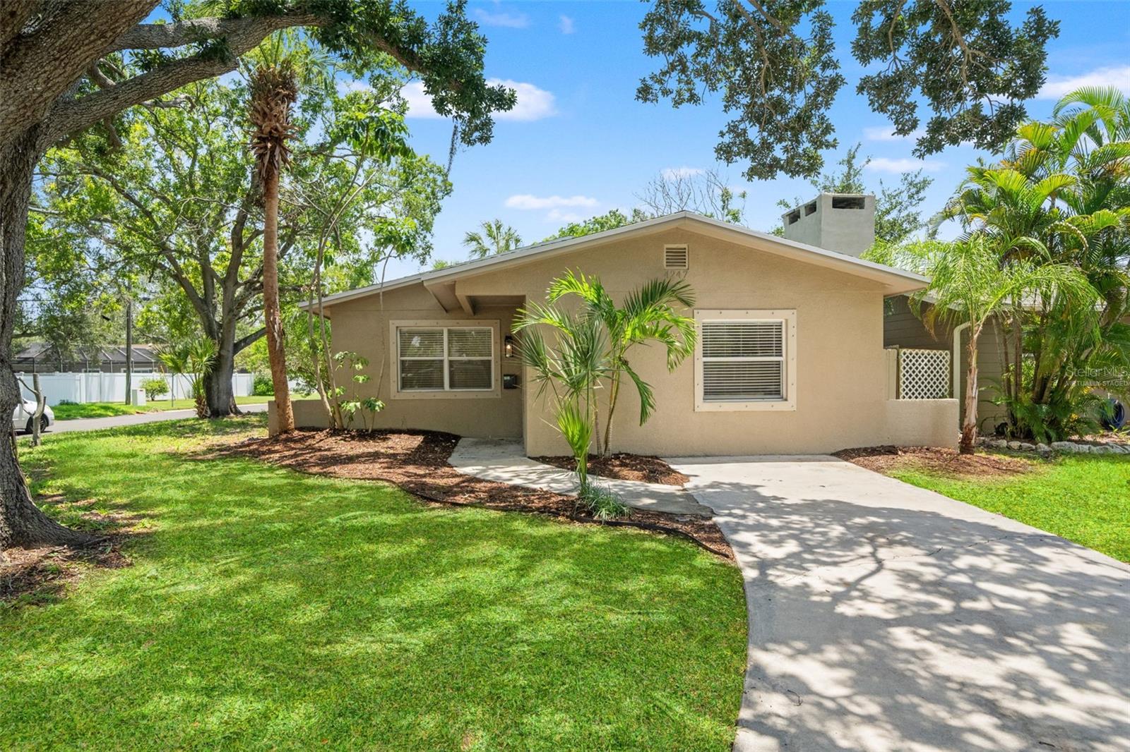 Welcome to your fully renovated 3 bedroom, 2 bathroom corner lot home. This large 1,500 square feet home is where modern upgrades meet the relaxed coastal lifestyle that makes Shore Acres in Northeast St. Petersburg one of Tampa Bay's most sought-after locations. Perfectly positioned just minutes from the sparkling waters of Tampa Bay, vibrant downtown St. Petersburg, and an endless variety of waterfront parks, dining, shopping, and entertainment, this completely renovated home offers the opportunity to enjoy Florida living at its finest.
Thoughtfully rebuilt from top to bottom, this home has undergone a comprehensive renovation with full permitting, inspections, and code-compliant improvements, giving buyers confidence and peace of mind. Major updates include a brand-new roof with architectural shingles, new underlayment, and flashing, along with a new Goodman HVAC system featuring a new exterior condenser and interior air handler. The family and laundry room floor has been raised for a seamless flow throughout the home. Plumbing improvements include a new water heater, kitchen sink, faucet, garbage disposal, and updated bathroom fixtures. The electrical system has also been modernized with outlets raised to current code, new switches, receptacles, and wiring for updated lighting throughout the home.
Inside, you'll find a bright, open interior designed for today's lifestyle. The beautifully remodeled kitchen features new cabinetry, elegant quartz countertops, a stylish tile backsplash, and brand-new appliances that create the perfect space for entertaining or everyday living. Fresh interior paint, new baseboards, insulation, drywall improvements, and new bedroom, family, & laundry room luxury vinyl flooring give the home a crisp, contemporary feel. Additional upgrades include new interior doors, updated hardware, new mirrors, and designer finishes throughout, creating a truly move-in-ready home.
Living in this location means embracing everything that makes St. Petersburg special. Spend weekends kayaking or paddleboarding along Tampa Bay, launch your boat from nearby marinas, or bike the scenic waterfront trails. Explore the award-winning restaurants, breweries, museums, and nightlife of vibrant downtown St. Pete, or relax on the world-famous beaches just a short drive away. Nearby waterfront parks, golf courses, fitness trails, and countless year-round festivals create an unmatched Florida lifestyle where every day feels like a vacation.
Whether you're searching for a primary residence, seasonal getaway, or investment opportunity, this home offers the rare combination of a fully renovated, move-in-ready home and one of St. Petersburg's most desirable coastal locations. Schedule your private showing today and experience everything this exceptional property and waterfront community has to offer.