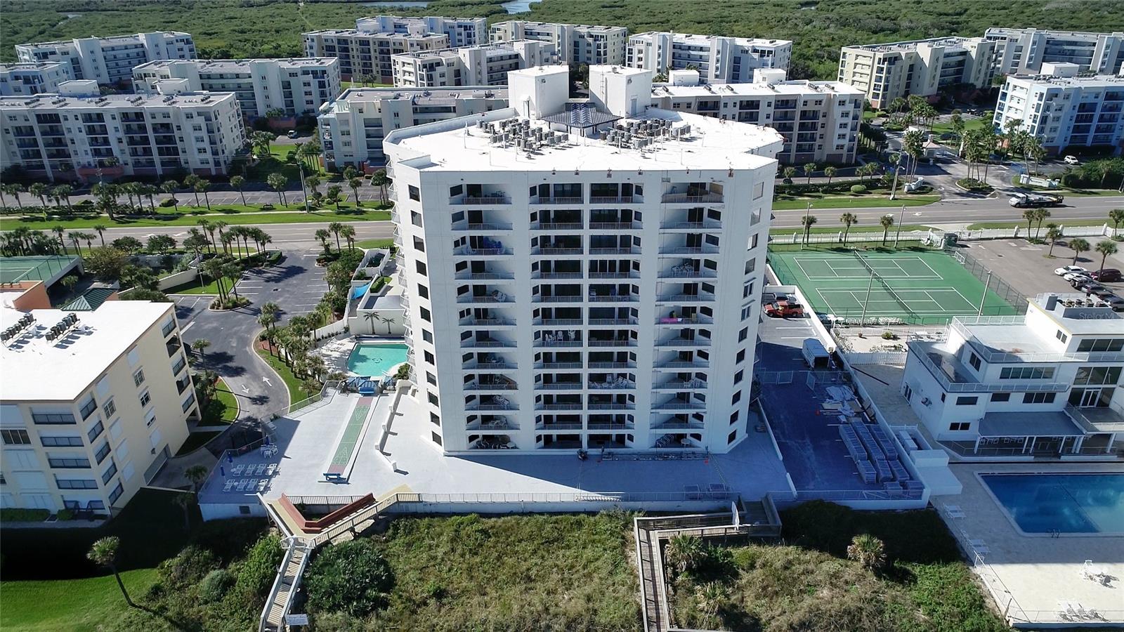 Direct Oceanfront exquisitely remodeled condo fully furnished with coastal furnishings. Direct ocean views from living, kitchen and primary bedroom. Relax and watch the Beautiful NSB Sunrise from your your Private Balcony or enjoy the Direct Ocean Views from you master bedroom with king size bed. Relax and watch the Beautiful NSB Sunrise from your your Private Balcony or enjoy the Direct Ocean Views from you master bedroom king size bed.. Brand New A/C Unit with MicroPure MX-4 Total Home Air Purifier and Brand New Washer and Dryer and Hot Water Heater and Appliances are less than 5 years old. Hurricane doors 1 year old. High end porcelain ceramic distressed beach-wood look tile throughout and matching driftwood look cabinets with grey and white quartz counter tops. This unit is not a box or shotgun style condo but has angled walls and an interesting layout. Seascape has two elevators, a club room, shuffleboard, tennis, saunas, hot tub and a seasonally heated pool as well as on-site property management. Good rental history. Do it yourself or turn rentals over to the managers and just relax.   Enjoy first come, first serve unassigned underground parking and a locked storage area. Bicycles are stored in the garage out of the elements. Located on the "no drive" beach and just minutes from of NSB's best shopping & restaurants. Isn't it time to start your best beach life? All info contained herein deemed accurate, but to be verified by the purchaser. ;LocationDescription: Condo ;Water: City