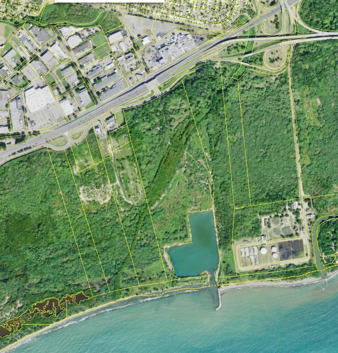 Vacant Land with an approved Marina Development. The Project included Dock areas with potential of 165 botes spaces in water plus additional spaces in Dry stack. Entrance of the Marina is up to 10 feet deep. Total land is 68 cuerdas. A complete project proposal including  Villas, Residential Apartments, Hotel and commercial spaces is available and included in the sale with related permits. Classification of Commercial Intermediate in the north side of the land and AE - or Commercial Touristic the south area of the land. The land is located in front of Road Number 2 , one of the most important roads in the South Island. Only 14 km from the Ponce Airport , 11 kms from Ponce Yacht & Fishing Club, 20 mins from Caja de Muerto Island and 5 mins to Cardona Island.